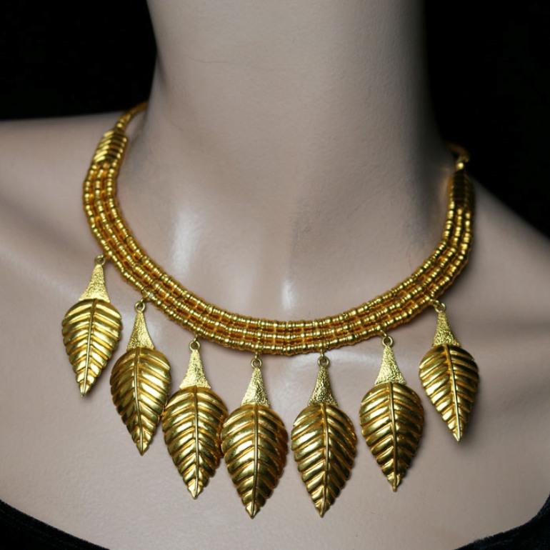 Women's or Men's Ilias Lalaounis Gold Suspending Seven Graduated Leaf Shaped Motifs Necklace
