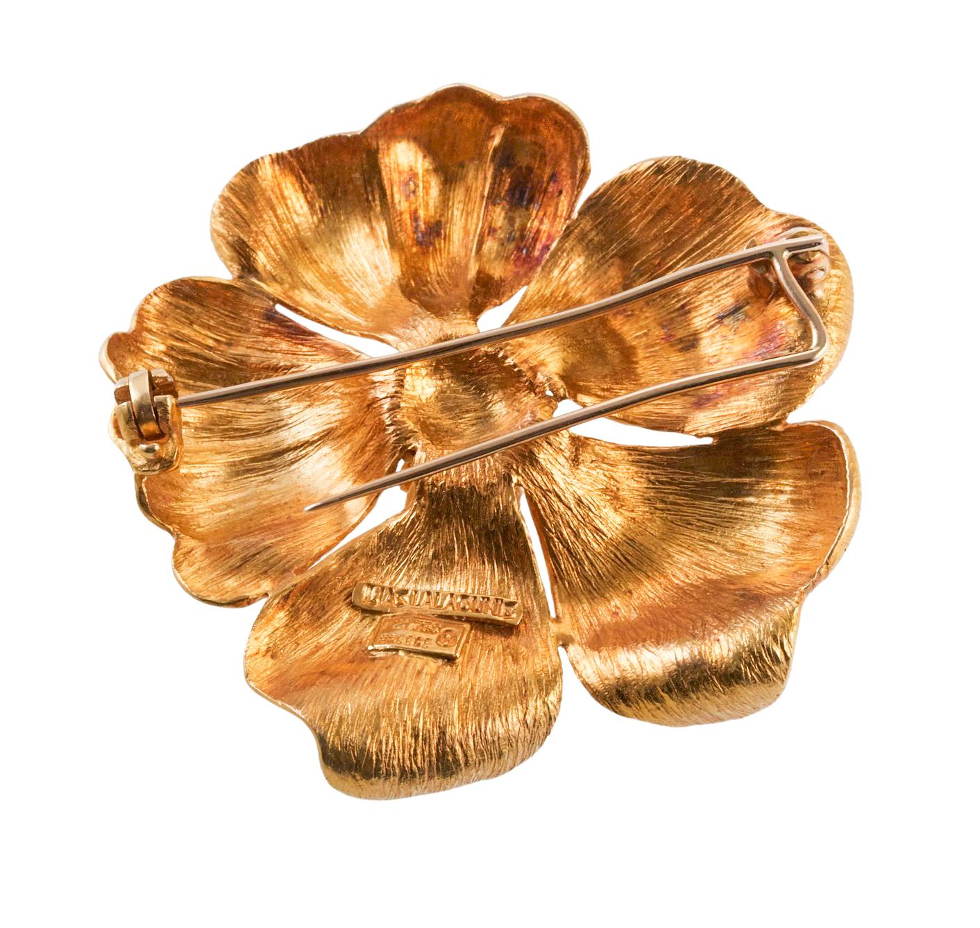18k yellow gold brooch by Ilias Lalaounis of Greece, depicting a five petal wild rose. Brooch measures 1.75