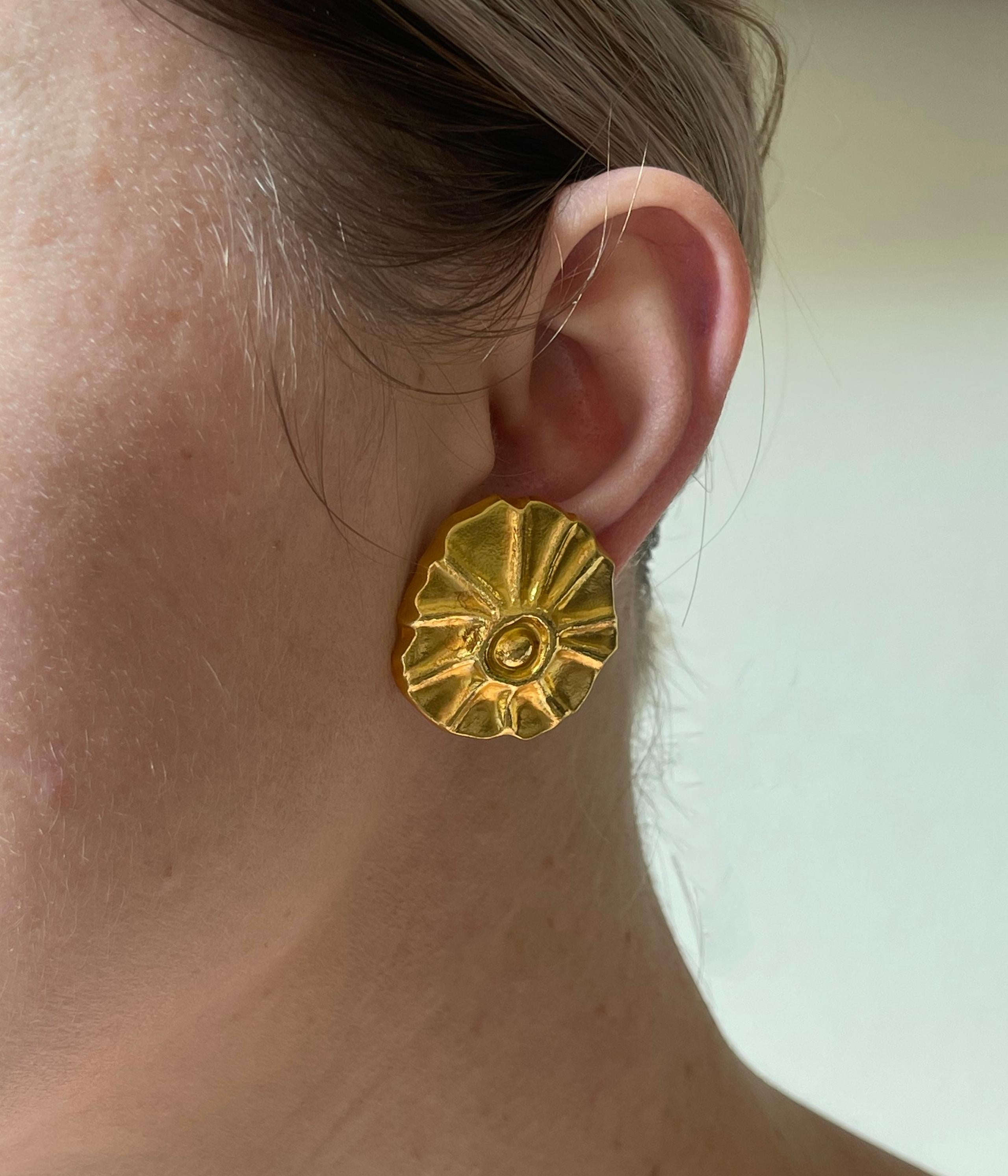 Pair of 22k gold shell/swirl motif earrings by Greek iconic designer Ilias Lalaounis. The earrings measure 125