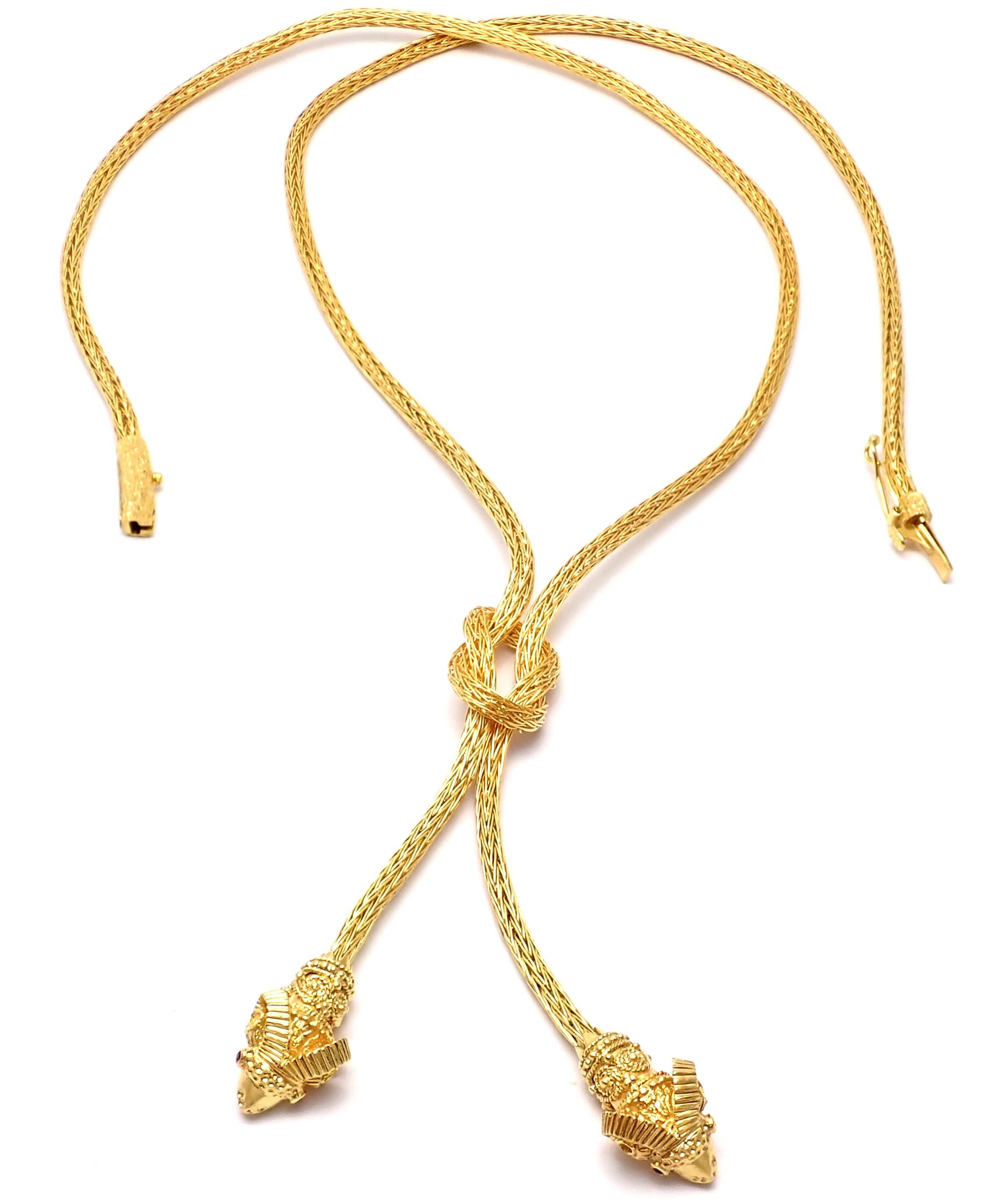 Ilias Lalaounis Greece 18k Yellow Gold Ruby Hercules Knot Ram Head Necklace By Illias Lalaounis Greece
With 4 small rubies in the eyes
Details: 
Length 24