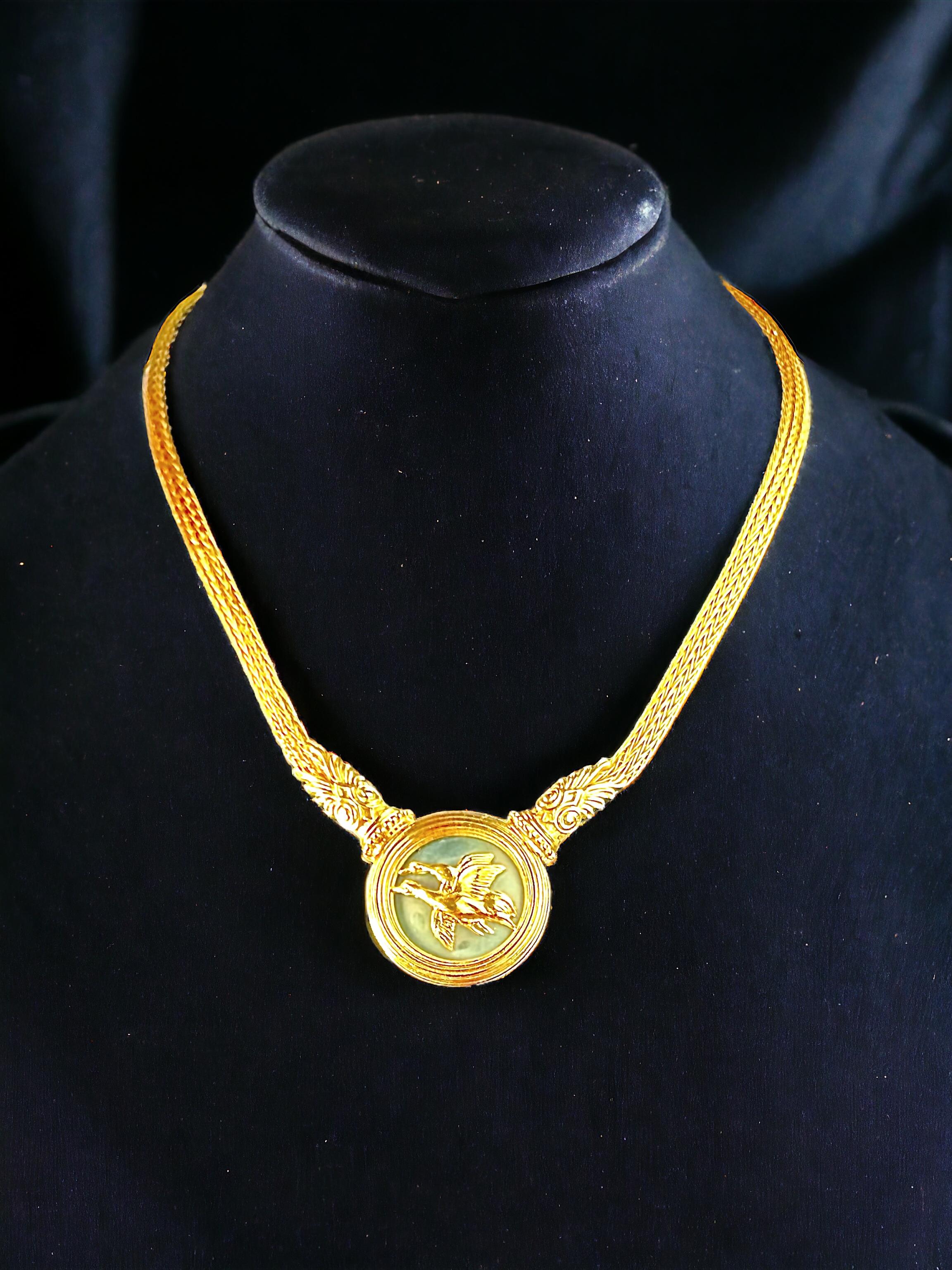 Rare Vintage necklace by  Illias Lalaounis. Masterfully crafted in the finest 18K yellow gold, this piece embodies the timeless artistry of Greek jewelry making.

The necklace’s weight of 49 grams attests to its substantial quality and the intricate