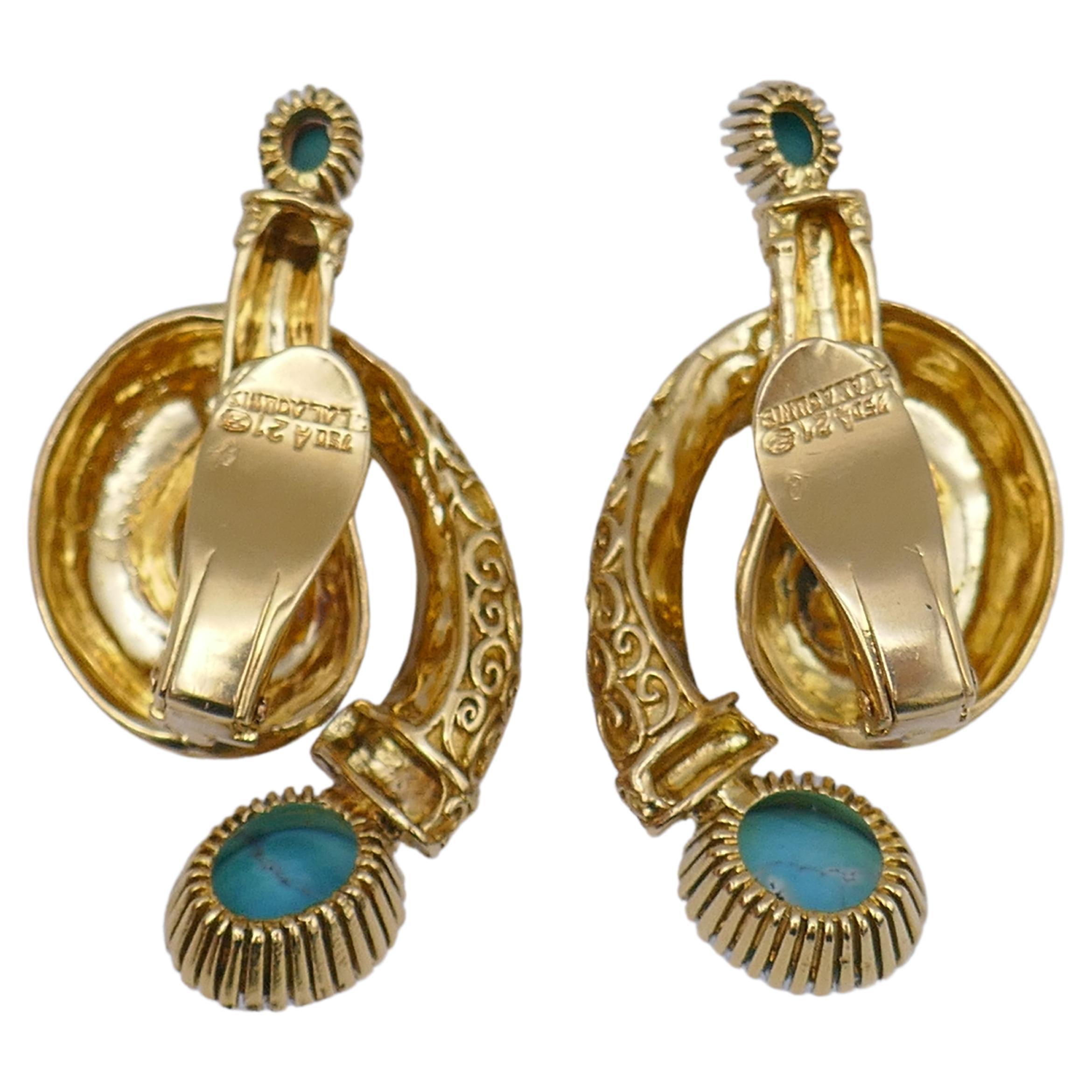 A gorgeous pair of clip-on earring by Ilias Lalaounis. Made of 18k yellow gold, featuring cabochon turquoise. Stamped with Lalaounis maker's mark and a hallmark for 18k gold.
Measurements: 1.5