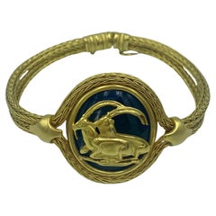 Vintage Ilias Lalounis 18k gold and lapis lazuli bracelet with mountain goat design