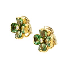 Boucles d'oreilles à clip en tourmaline verte, diamant et trèfle à quatre feuilles de l'Illario