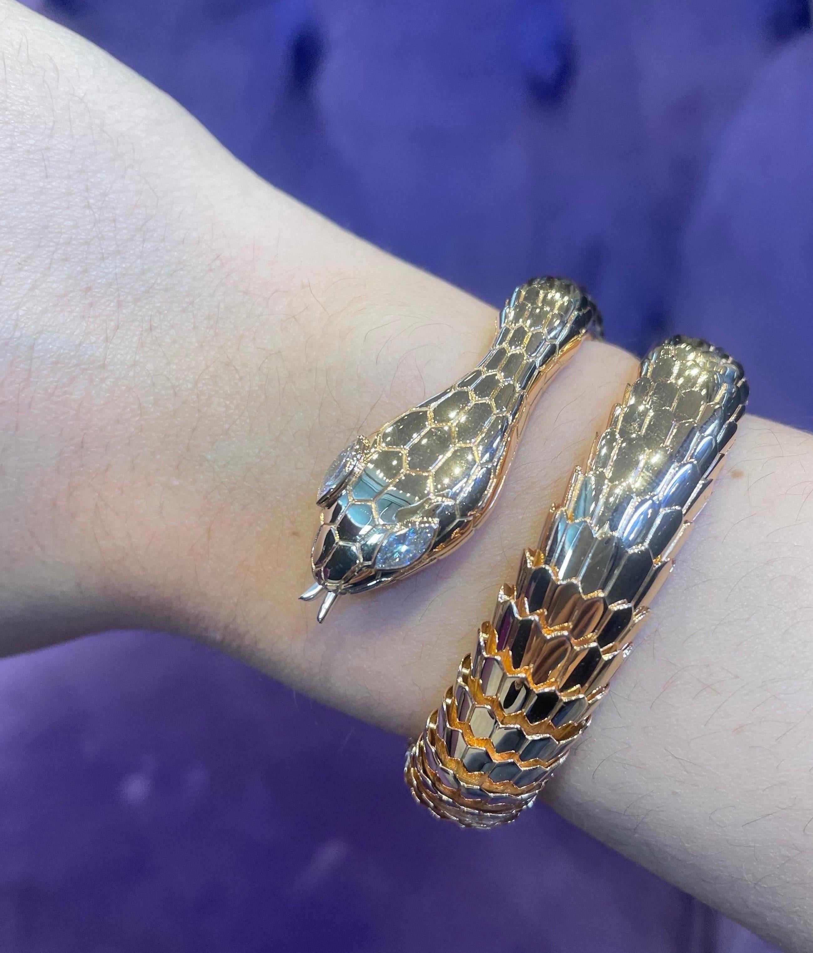 Illario Rose Gold and Diamond Snake Bracelet 

A beautiful rose gold wrap snake bracelet adorned with marquis diamonds depicting the snakes eyes. 

Approximate Measurements: 2 inches 

Illario hallmarked

Stamped: 750

Metal Type: 18 Karat Gold