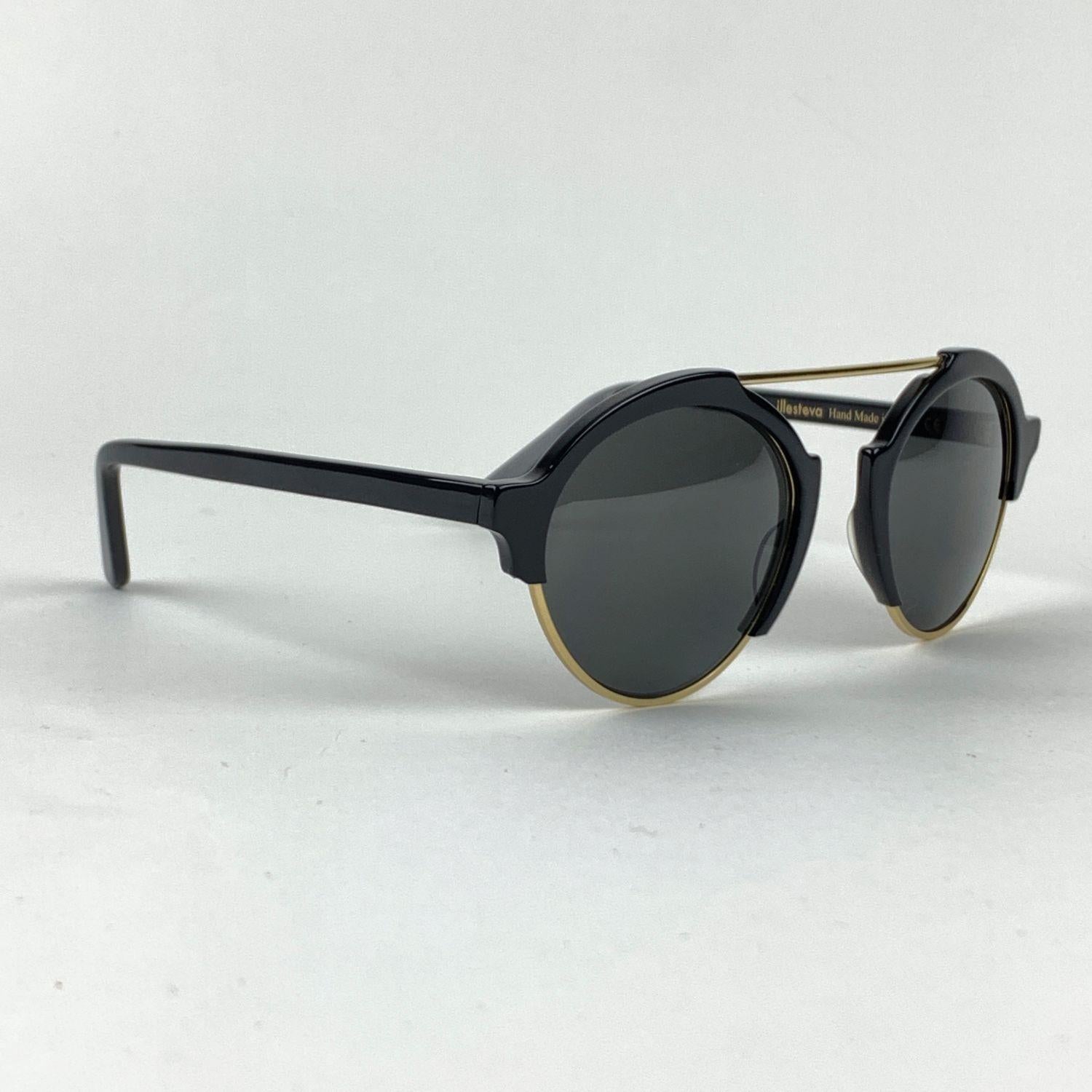 Illesteva Sunglasses, mod. Milan 3, C.11. Handmade in Italy. Black acetate & stainless steel very light frame, grey original lenses. Mint & Boxed. Details MATERIAL: Acetate COLOR: Black MODEL: Milan 3 GENDER: Unisex Adults COUNTRY OF MANUFACTURE: