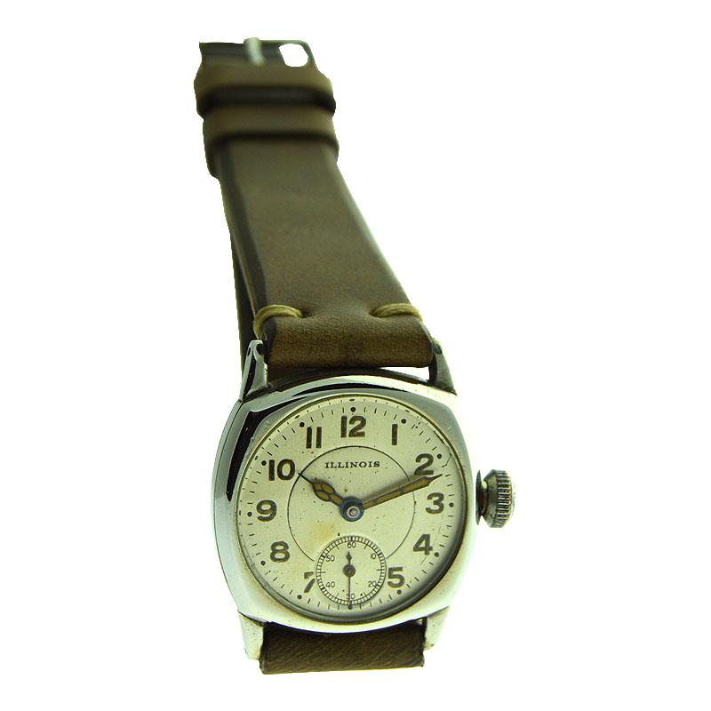 FACTORY / HOUSE: Illinois Watch Company
STYLE / REFERENCE: Cushion Shaped Military Style 
METAL / MATERIAL: Nickel Silver
CIRCA / YEAR:  1916
DIMENSIONS / SIZE: 37mm X 31mm
MOVEMENT / CALIBER: Manual Winding / 11 Jewels / Handmade
DIAL / HANDS: