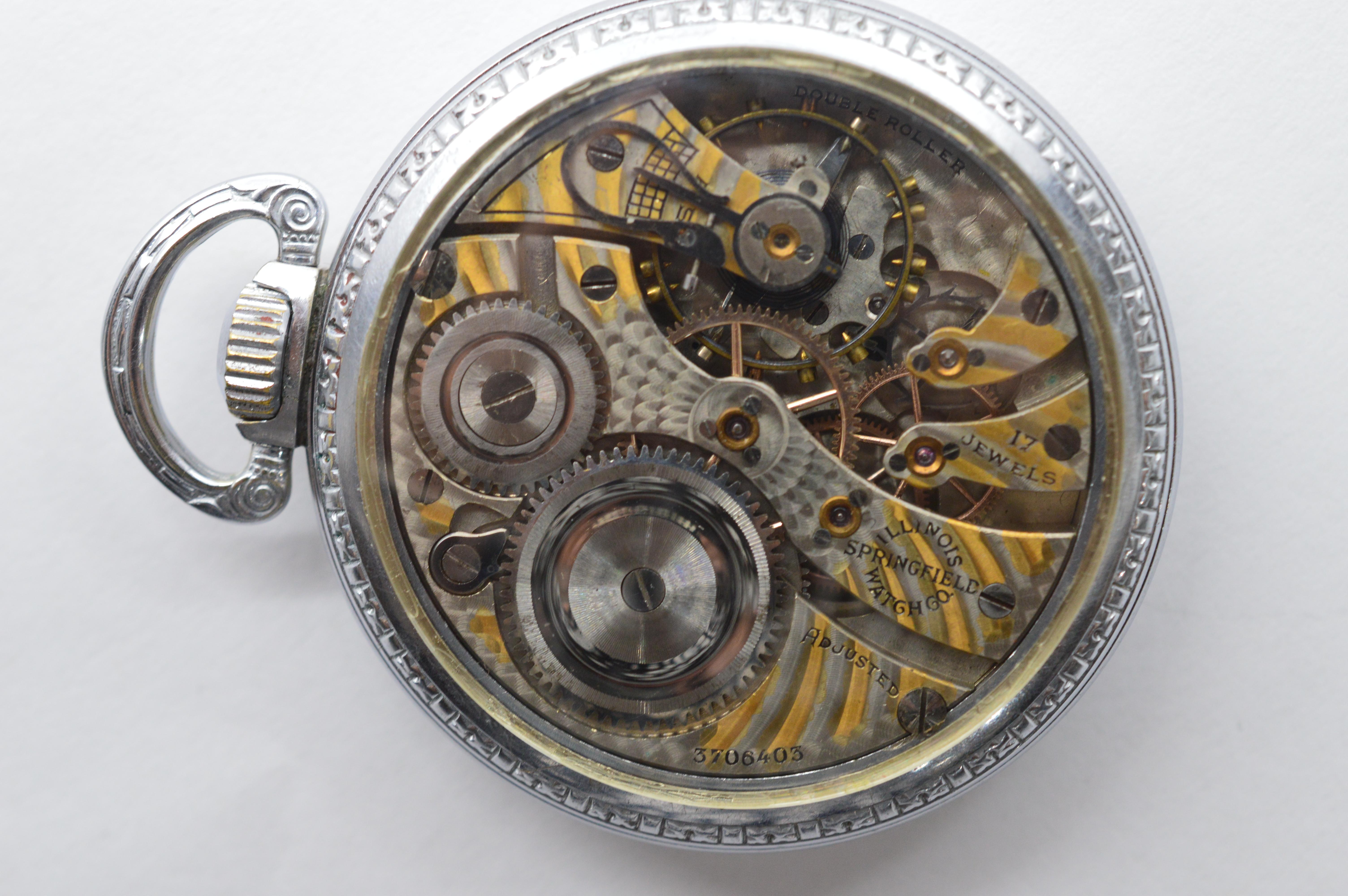 Enjoy seeing the craftsmanship in this Illinois 305 Steel Pocket Watch expertly restored with a unique display back allowing the intricate parts of this time piece to be viewed. Number 3706403, circa 1920. Measures 51 millimeters. Seventeen jeweled