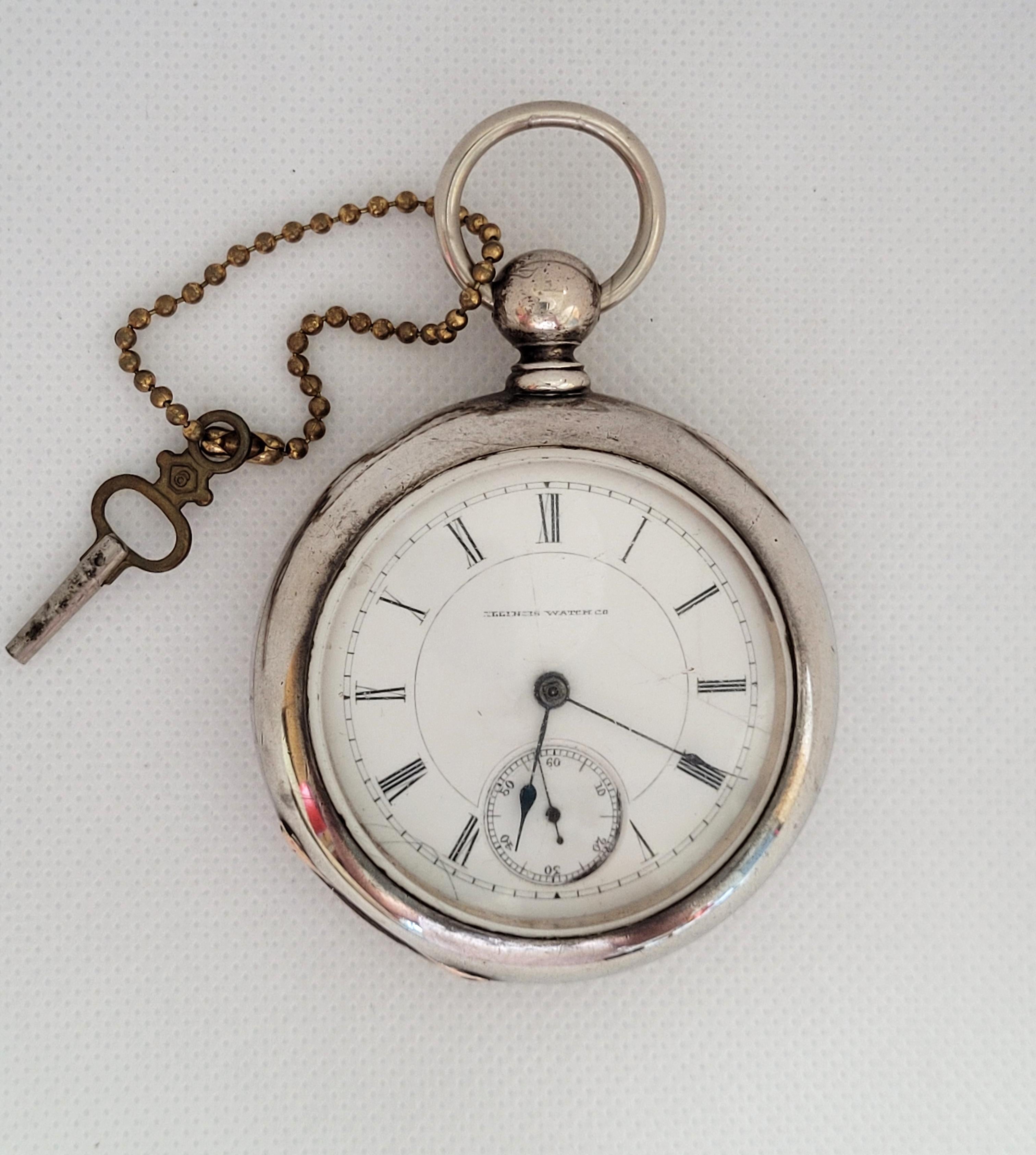 Vintage Illinois co. pocket watch in good working condition. Year 1886. The case is sterling silver, 60mm diameter, 20mm thick with a thick glass crystal that is clean with very slight scratches. The movement serial number is 66472, working, 11