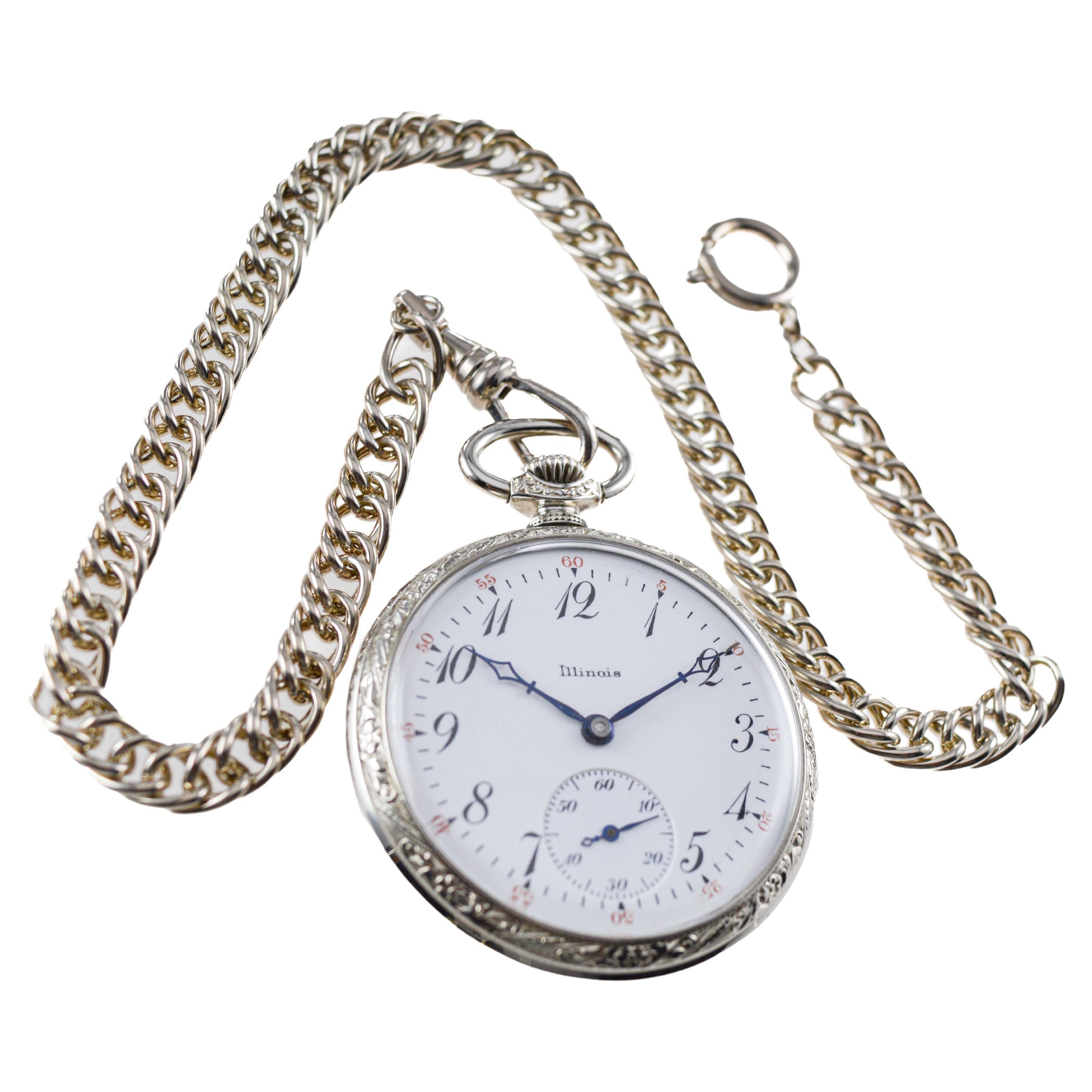 FACTORY / HOUSE: Illinois Watch Company
STYLE / REFERENCE: Open Faced Pocket Watch
METAL / MATERIAL: White Gold-Filled
CIRCA / YEAR: 1919 
DIMENSIONS / SIZE: Diameter 43mm
MOVEMENT / CALIBER: Manual Winding / 15 Jewels / Caliber 12 Size
DIAL /
