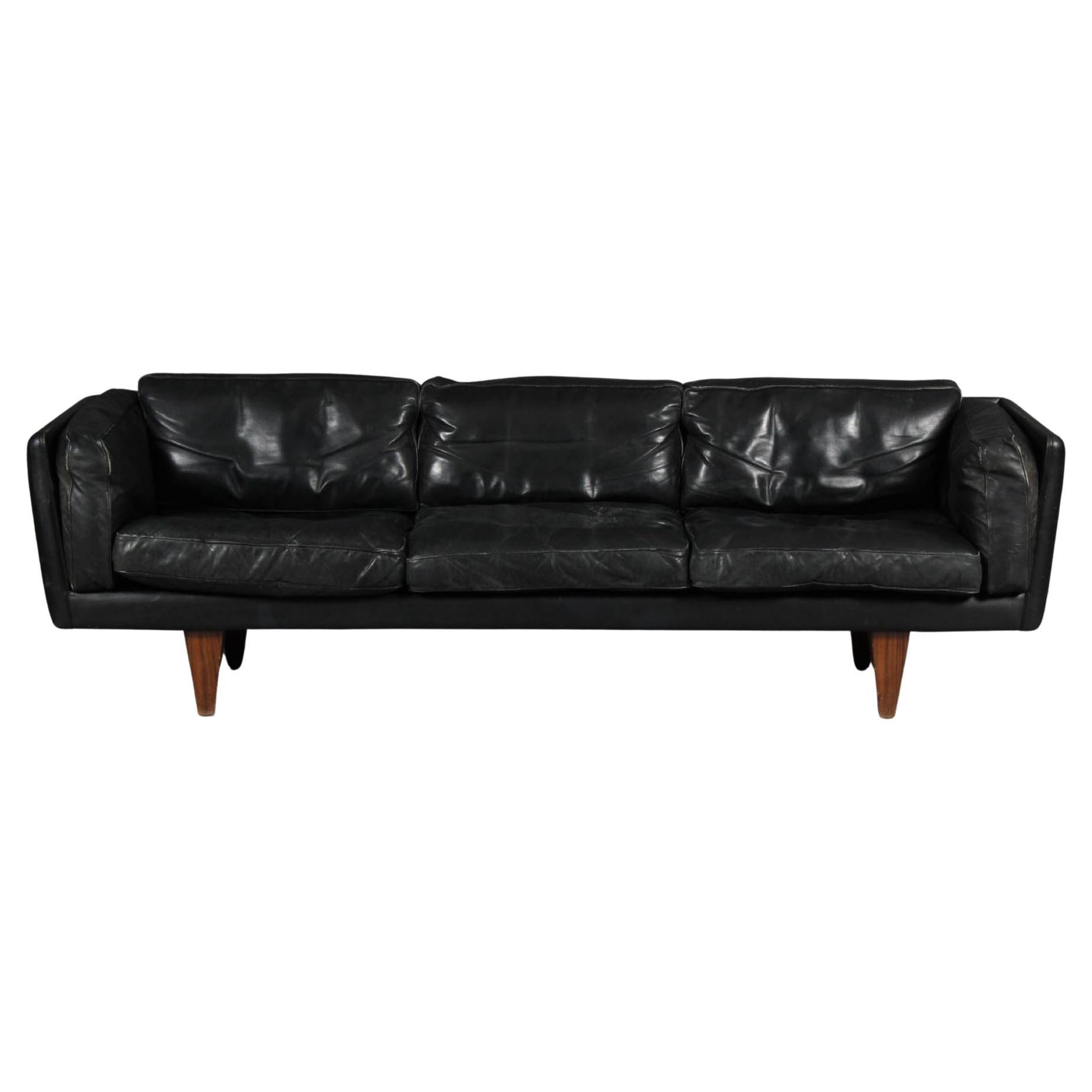 Illum Wikkelsø Black Leather and Rosewood Three-Seater Sofa For Sale