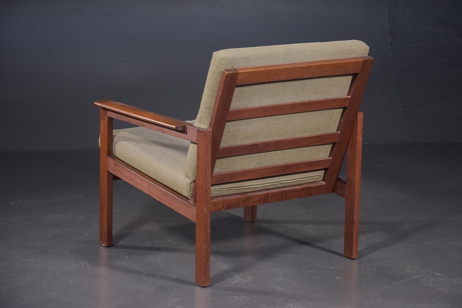 Origin: Denmark
Designer: Illum Wikkelsø
Manufacturer: N. Eilersen
Era: 1960s
Materials: Teak, Wool
Measurements: 27? wide x 29? deep x 27.5? tall
Seat: 23? wide x 23? deep x 16.5? tall

Condition: Frame in excellent original condition.