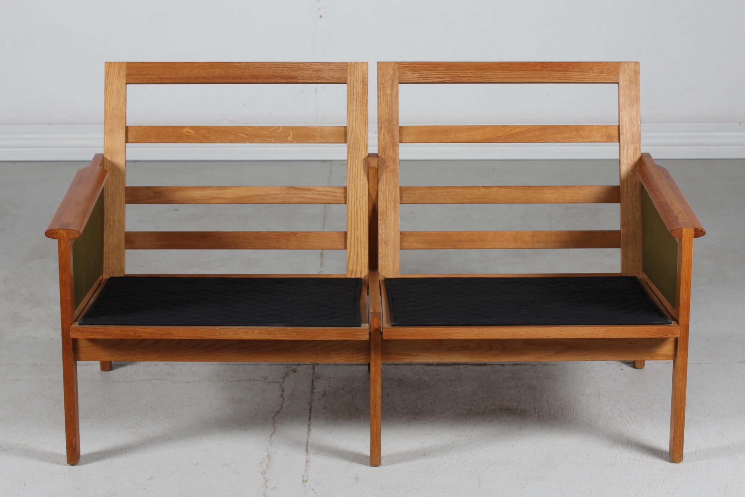 Illum Wikkelsø Capella Sofa of Oak + Green Cushions Niels Eilersen Denmark 1960s For Sale 6