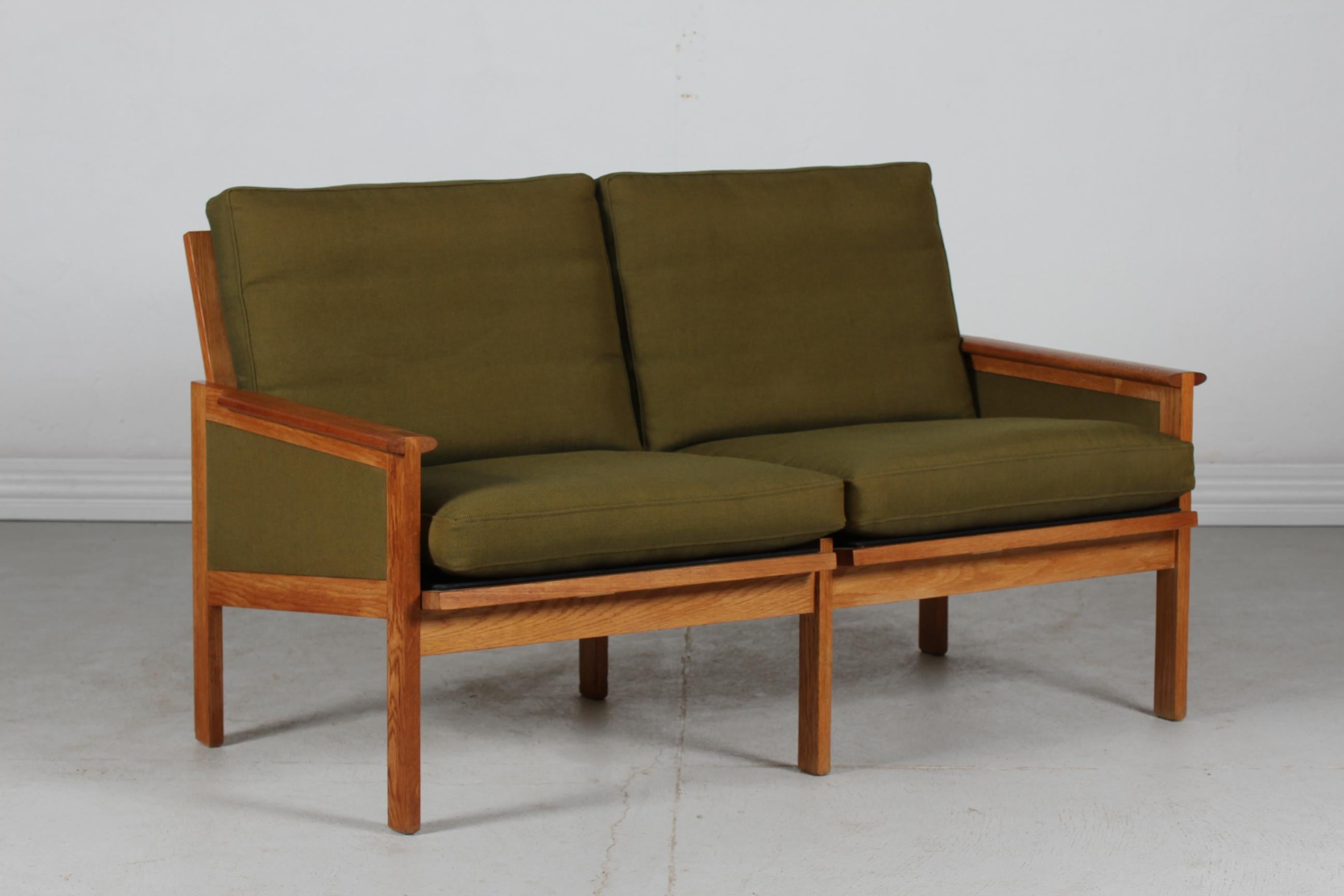 Mid-Century Modern Illum Wikkelsø Capella Sofa of Oak + Green Cushions Niels Eilersen Denmark 1960s For Sale