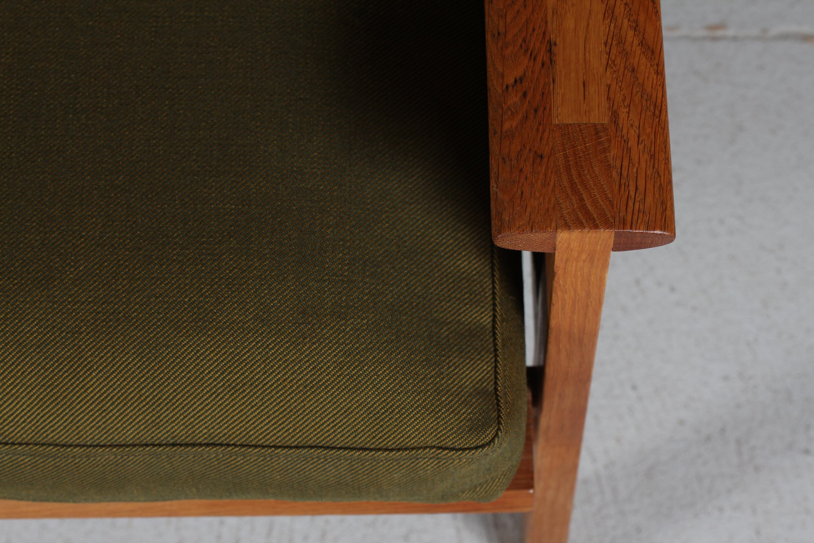 Illum Wikkelsø Capella Sofa of Oak + Green Cushions Niels Eilersen Denmark 1960s For Sale 1