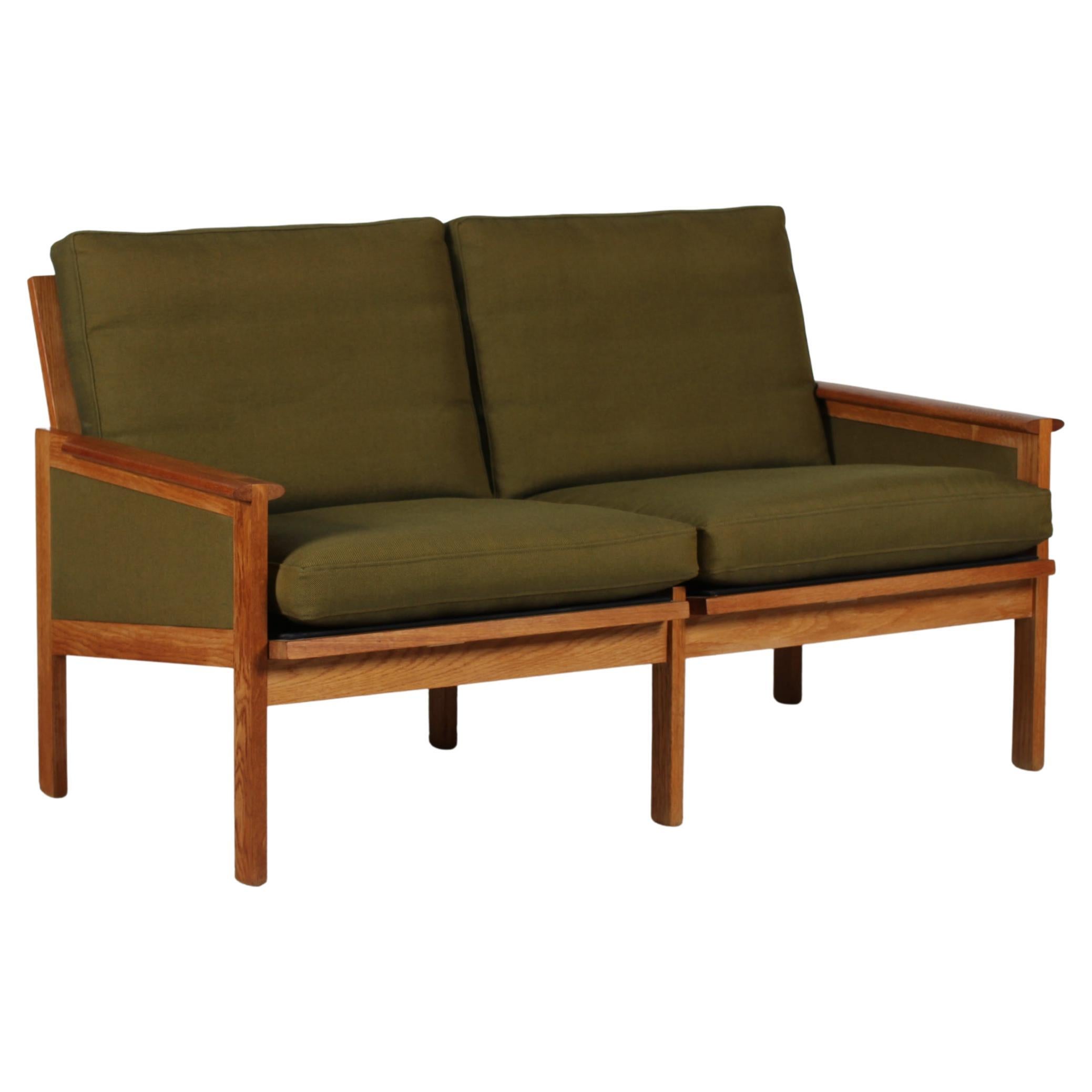 Illum Wikkelsø Capella Sofa of Oak + Green Cushions Niels Eilersen Denmark 1960s For Sale