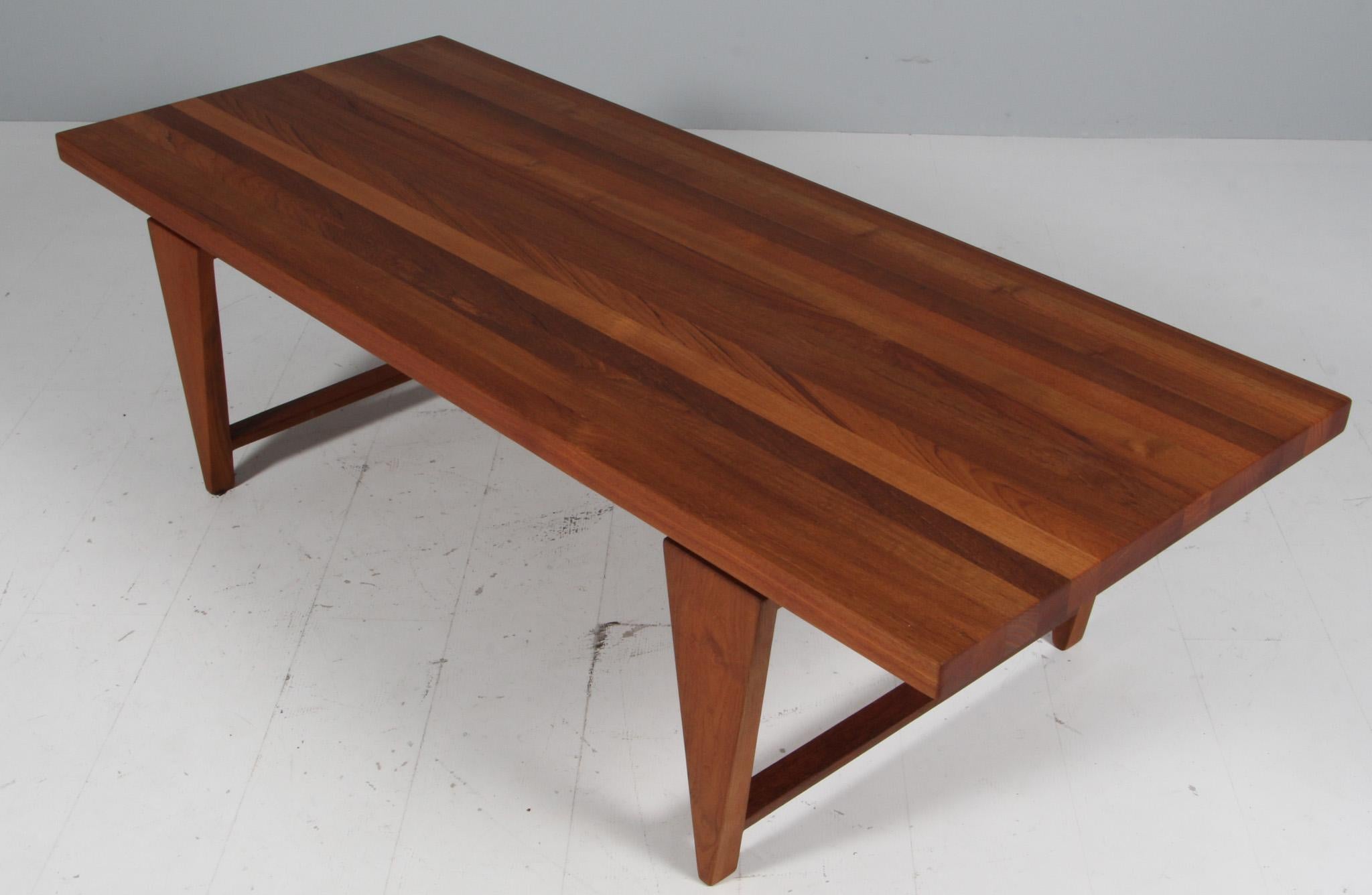 Illum Wikkelsø coffee table in solid teak.

Made by Mikael Laursen, Århus.