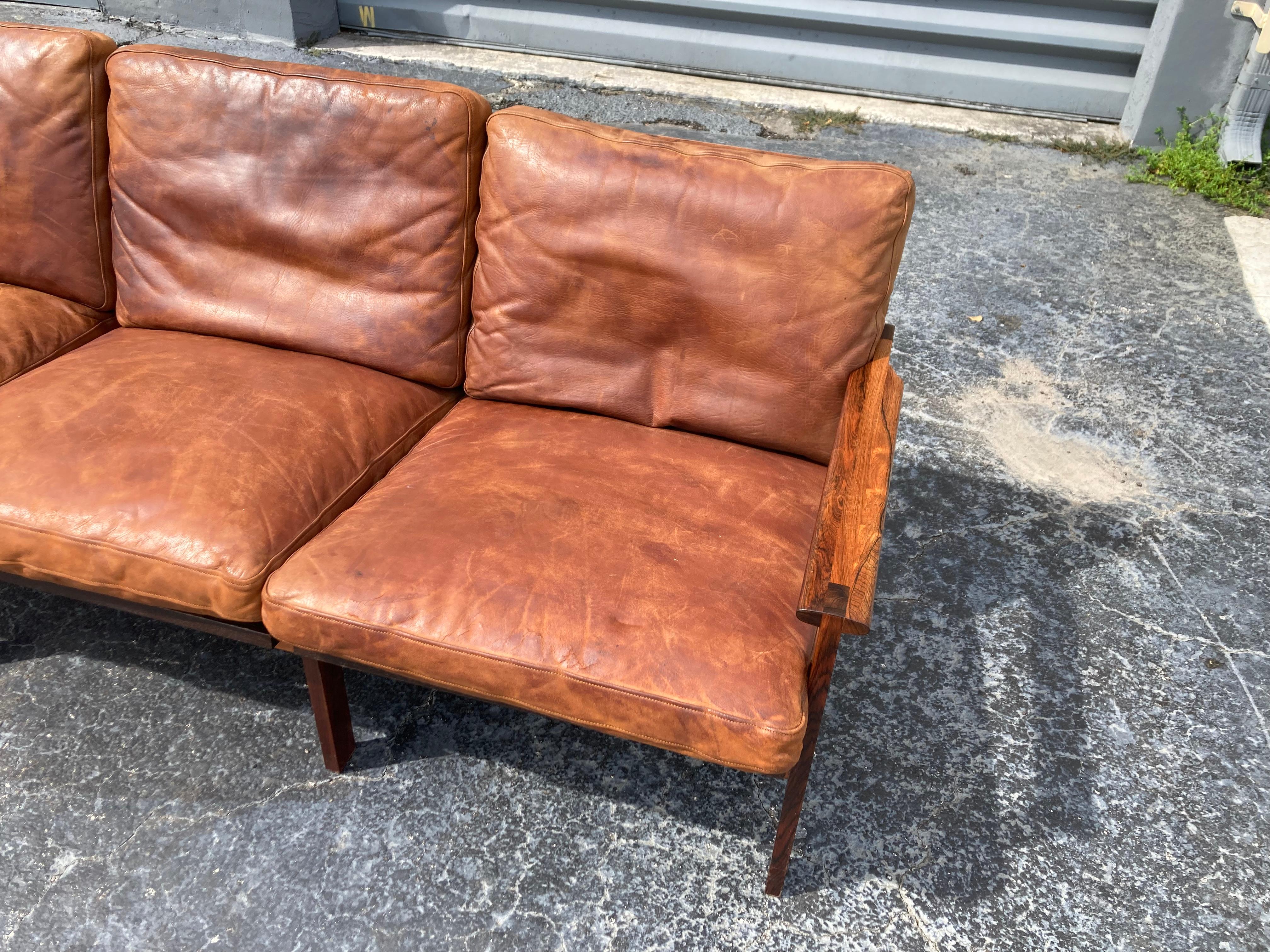 Mid-20th Century Illum Wikkelsø Danish Modern Leather 'Capella' Sofa Cognac Leather Rosewood For Sale