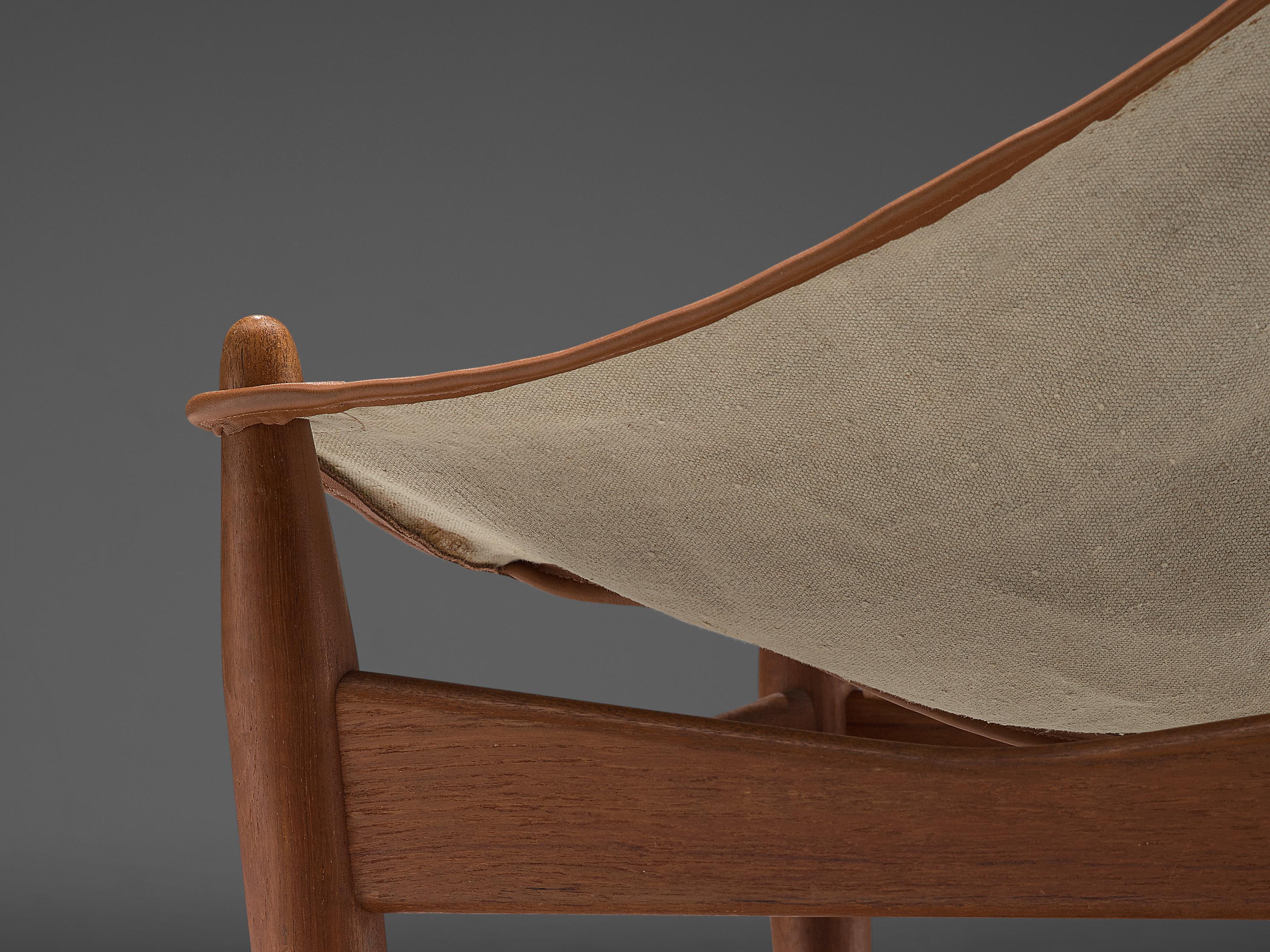 Sillón y otomana Illum Wikkelsø con asiento de lona Cuero en venta