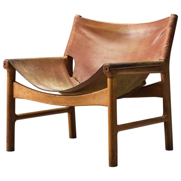 Illum Wikkelsø Easy Chair in Oak and Leather