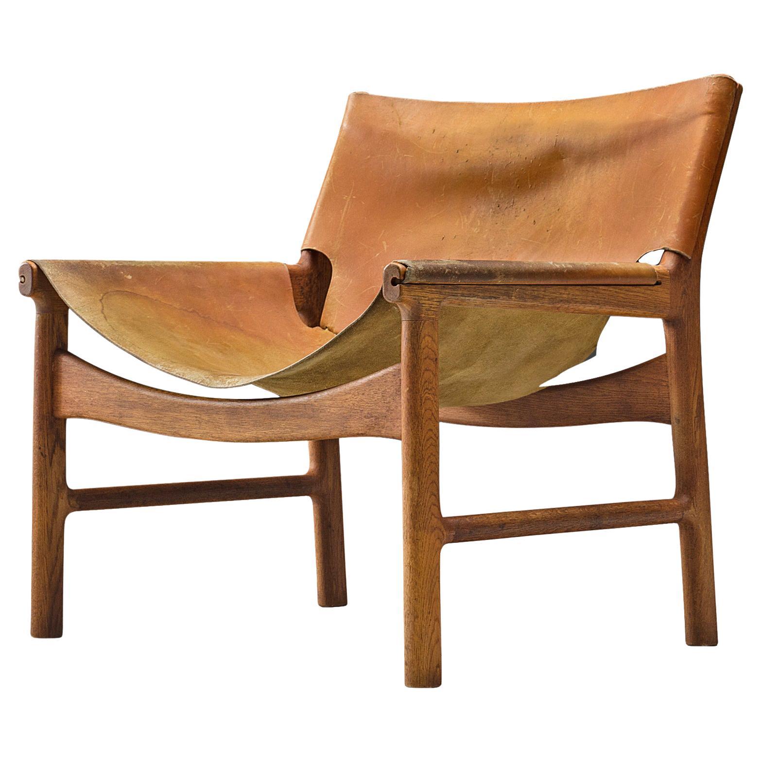 Illum Wikkelsø Easy Chair in Oak and Leather
