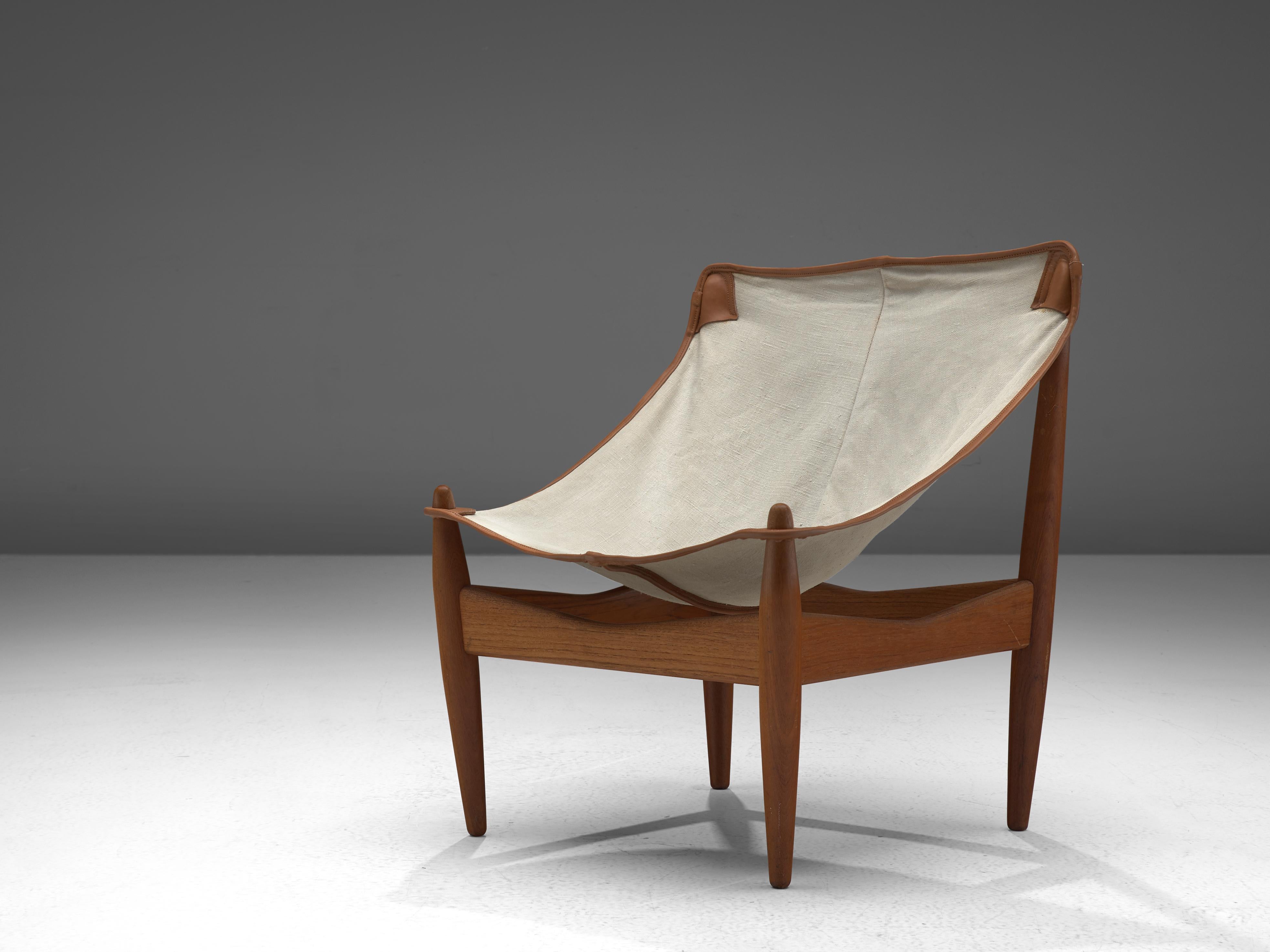 Illum Wikkelsø para C.F. Christiansen, butaca modelo 272, teca, lona blanquecina, cuero, Dinamarca, 1963

Butaca del diseñador danés Illum Wikkelsø en teca y lona. Las patas de teca maciza son cónicas y están ligeramente inclinadas hacia fuera, lo