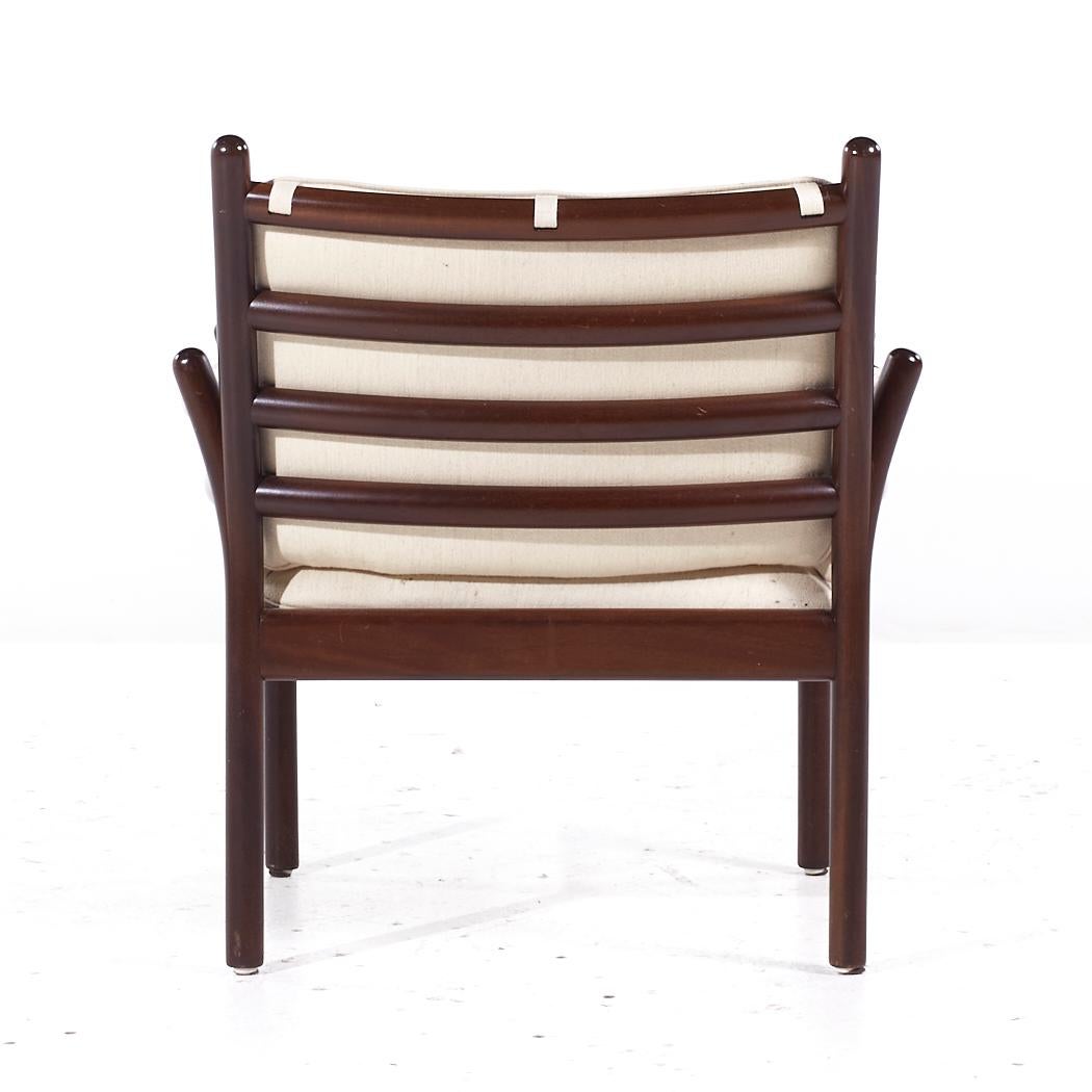 Illum Wikkelsø para CFC Silkeborg MCM Sillones Genius de palisandro danés - Pareja en venta 1