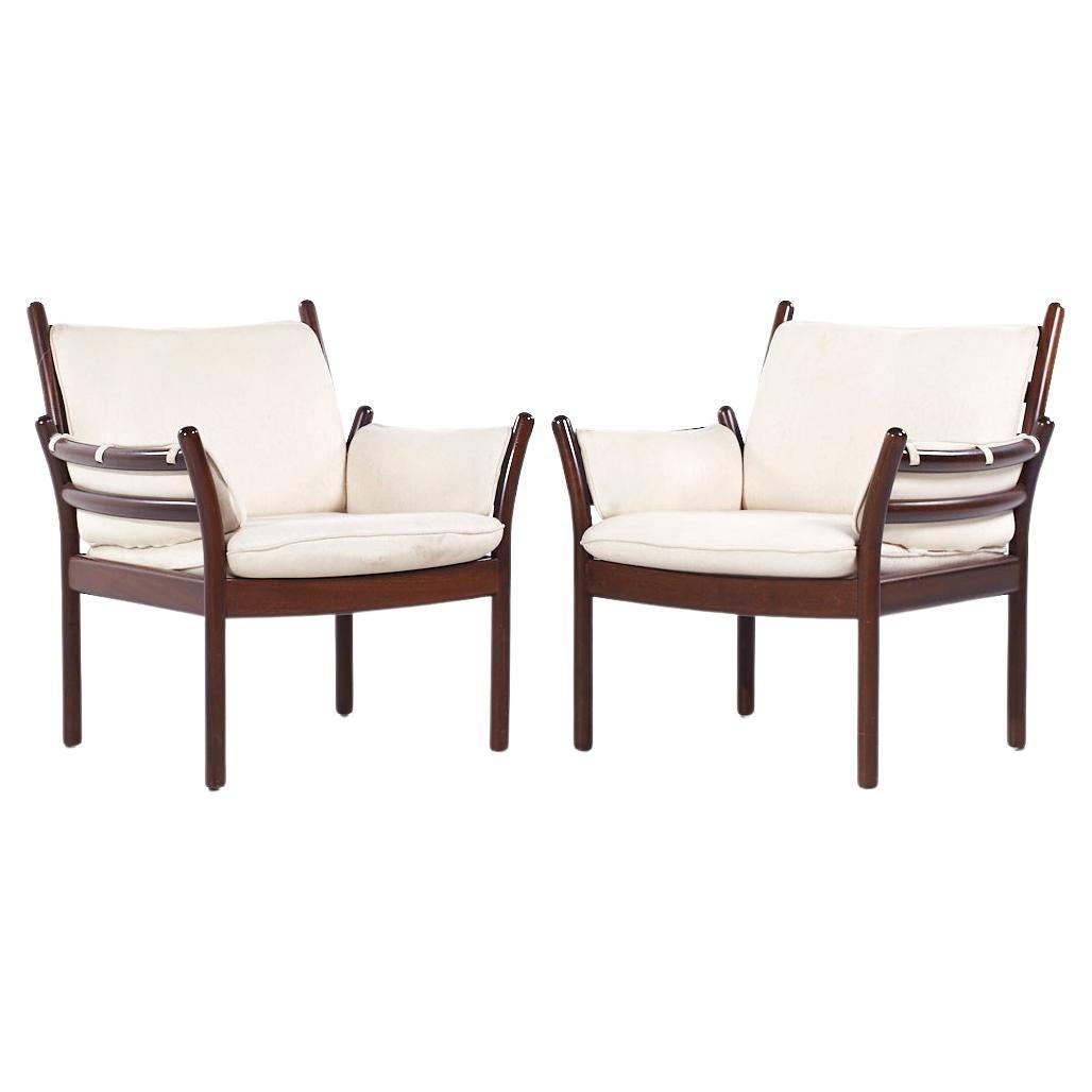 Illum Wikkelsø for CFC Silkeborg MCM Danish Rosewood Genius Lounge Chairs - Pair