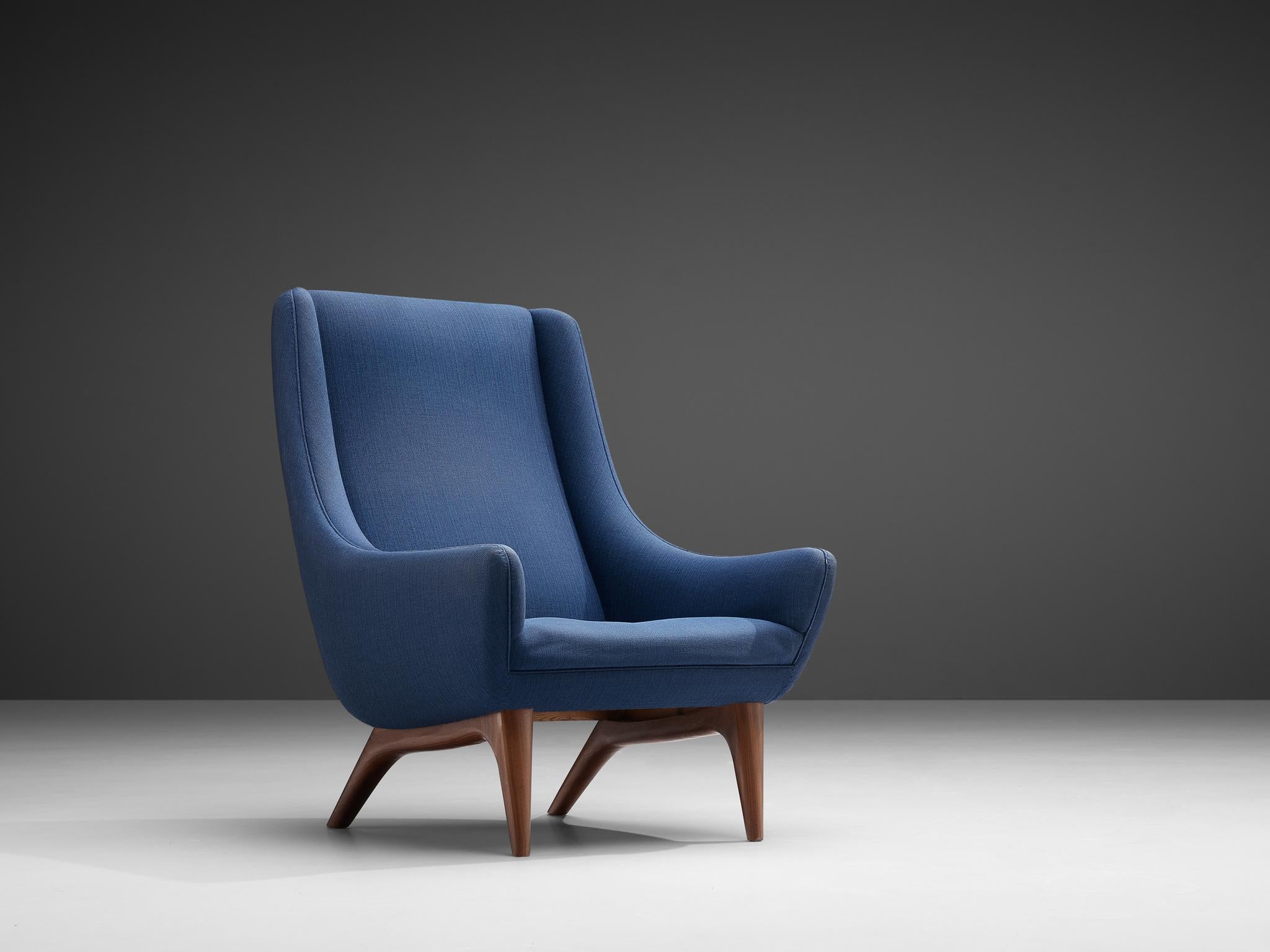 Illum Wikkelsø for A. Mikael Laursen & Søn, lounge chair model 'ML-140', fabric, teak Denmark, 1950s

Comfortable lounge chair by Danish designer Illum Wikkelsø. The shape of the chair is characterized by the high backrest that floats over into the