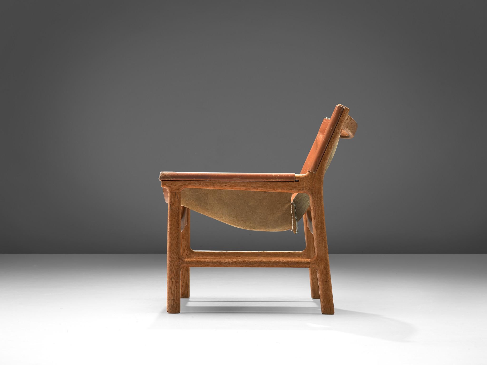 Illum Wikkelsø Lounge Chair in Cognac Leather and Oak 1