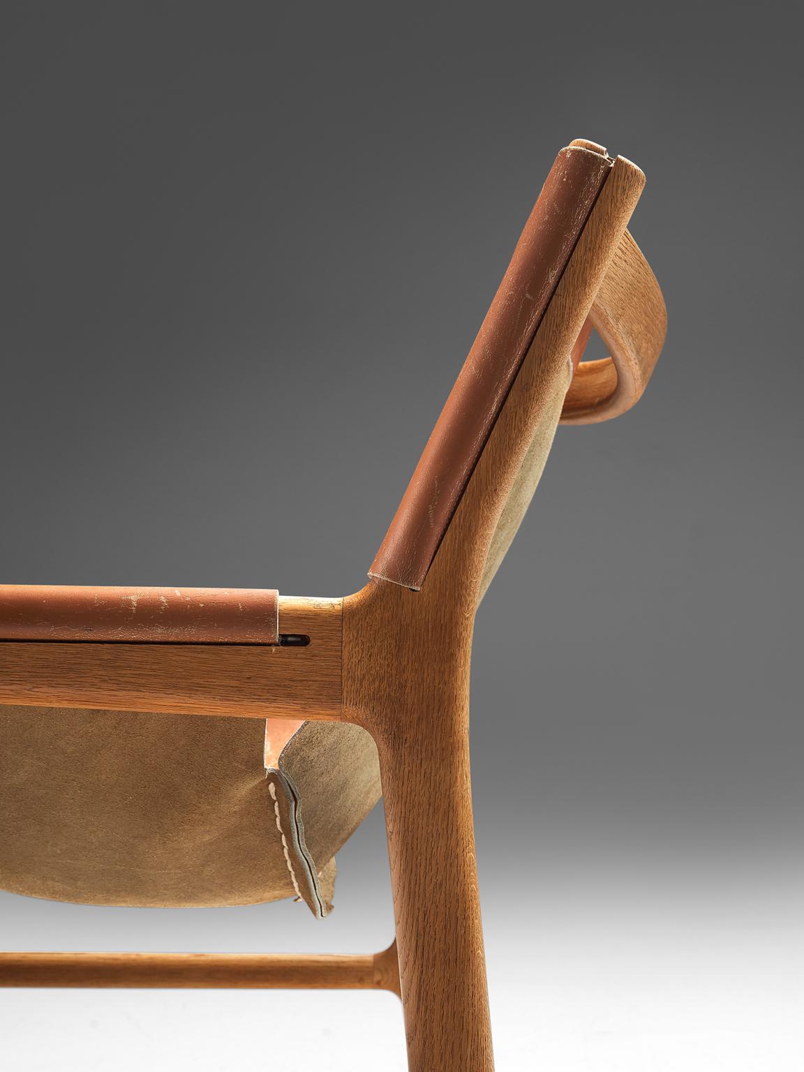 Illum Wikkelsø Lounge Chair in Cognac Leather and Oak 1
