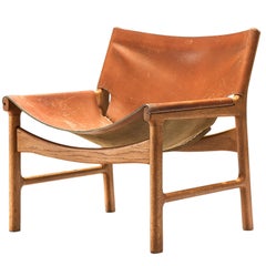 Illum Wikkelsø Lounge Chair in Cognac Leather and Oak