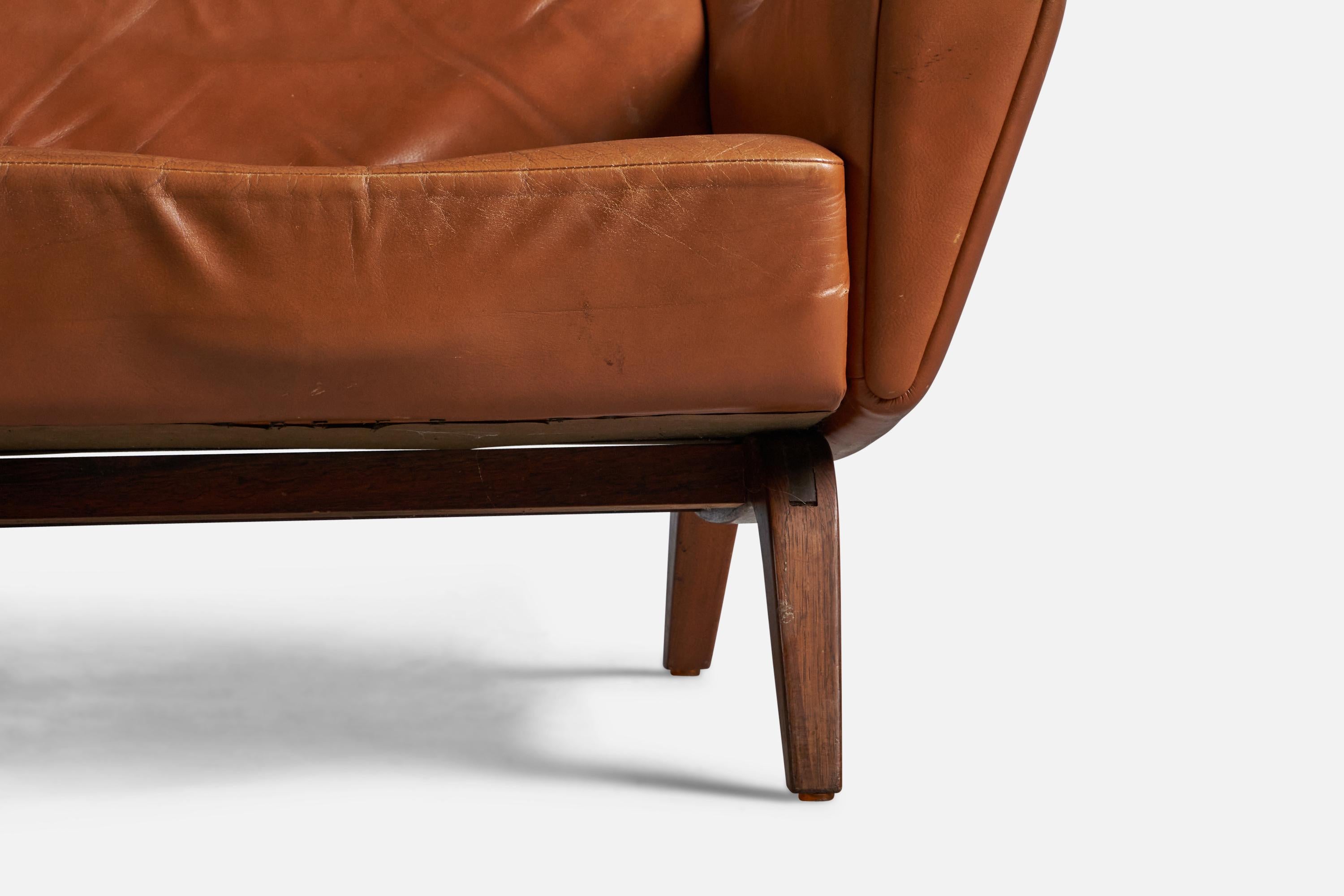 Illum Wikkelsø, Lounge Chair, Leather, Rosewood, Denmark, 1960s In Good Condition In High Point, NC