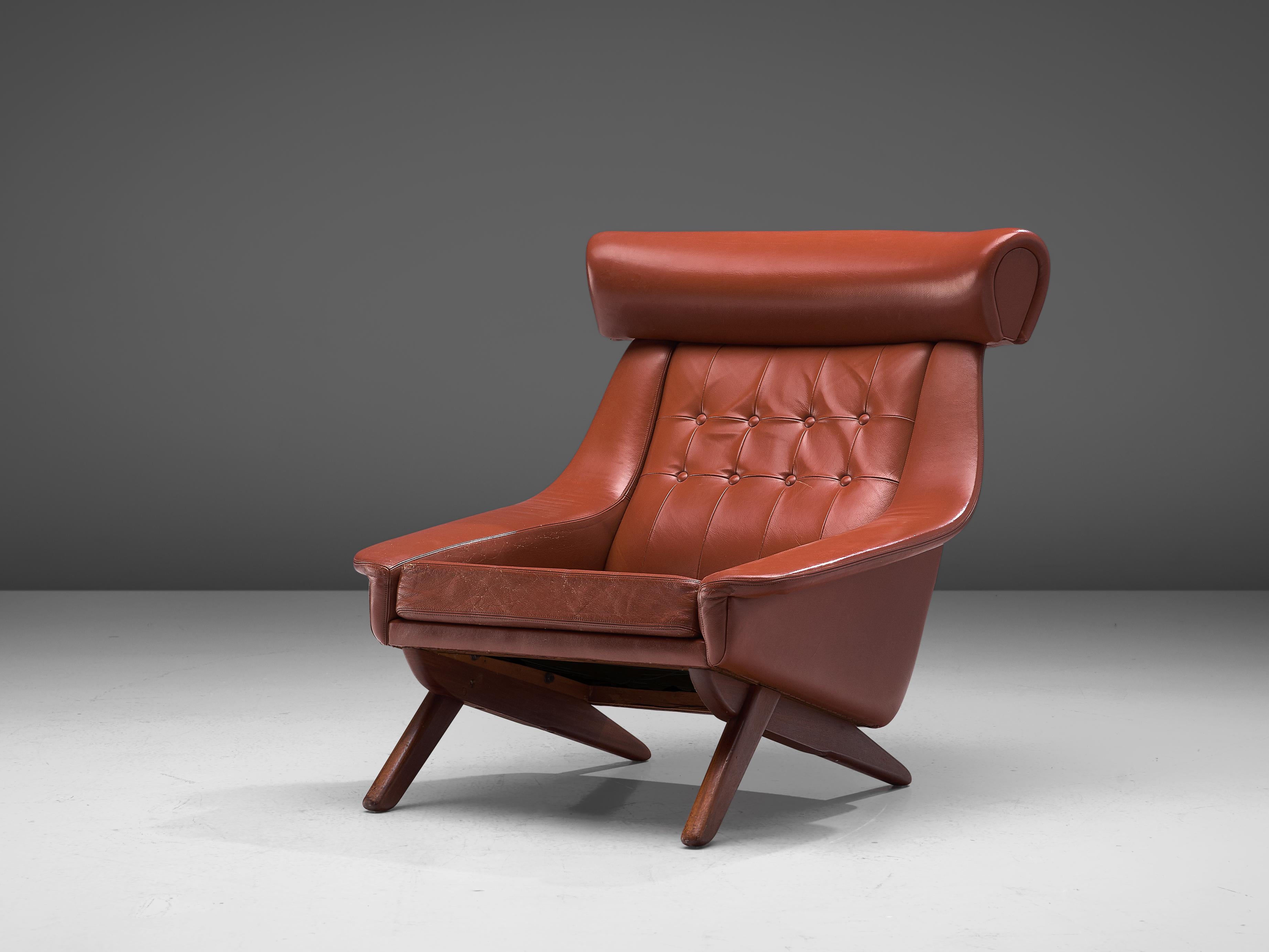 Illum Wikkelsø, lounge chair ‘Ox’, red leatherette, wood, Denmark, 1960s

Due to the prominent horizontal headrest this lounge chair by Illum Wikkelsø is nicknamed ‘Ox’. In a way it also visually refers to Hans J. Wegner’s ‘Ox’ chair (1960). This