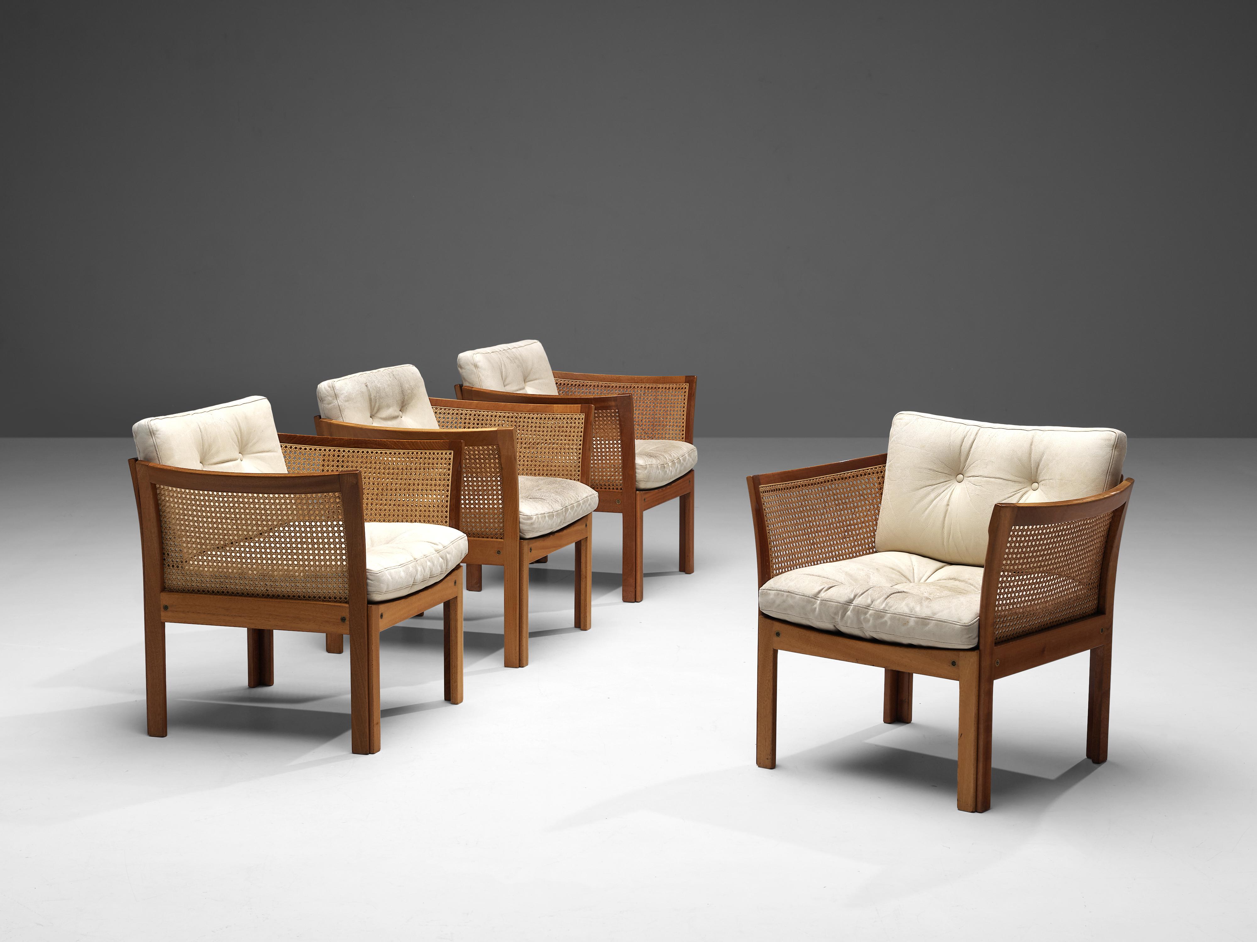 Illum Wikkelsø, lounge chairs, cane, mahogany, leather, Denmark, 1950s

These easy chairs by Illum Wikkelsoø shows a beautiful combinations of materials and textures. The chairs' most distinctive feature is the frame in mahogany that curves