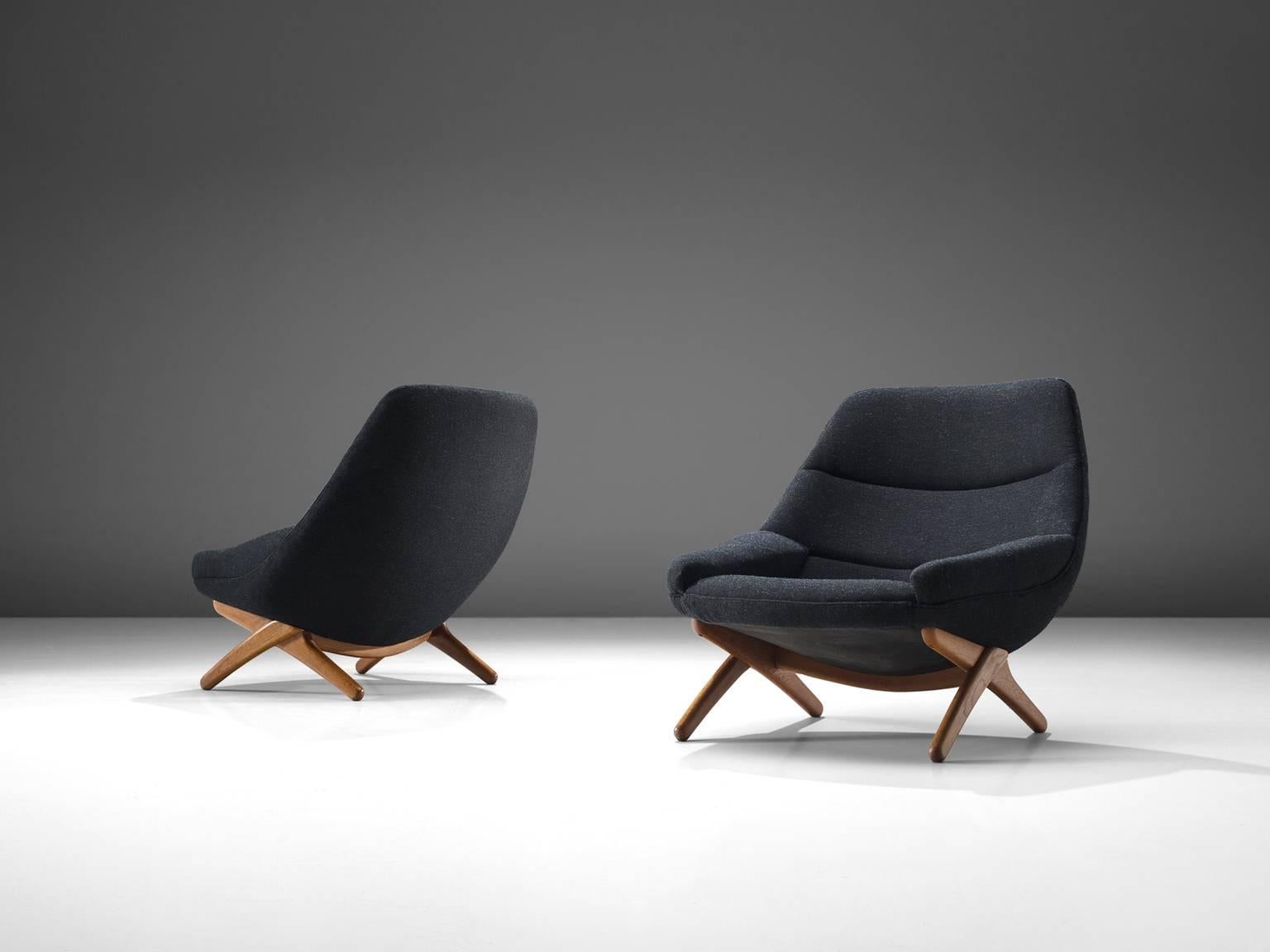 Illum Wikkelsø for Mikael Laursen, lounge chairs model 91, black to grey wool and oak, Denmark, 1960s. 

This set of ML 91 model lounge chairs was designed by Illum Wikkelsø and manufactured by Mikael Laursen in Denmark in the 1960s. This set is