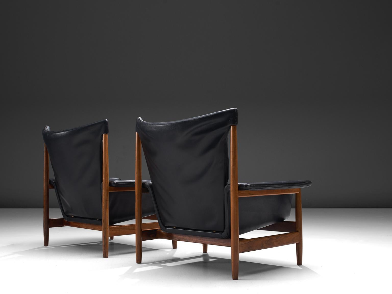 Danish Illum Wikkelsø Lounge Chairs with Black Leather and Rosewood