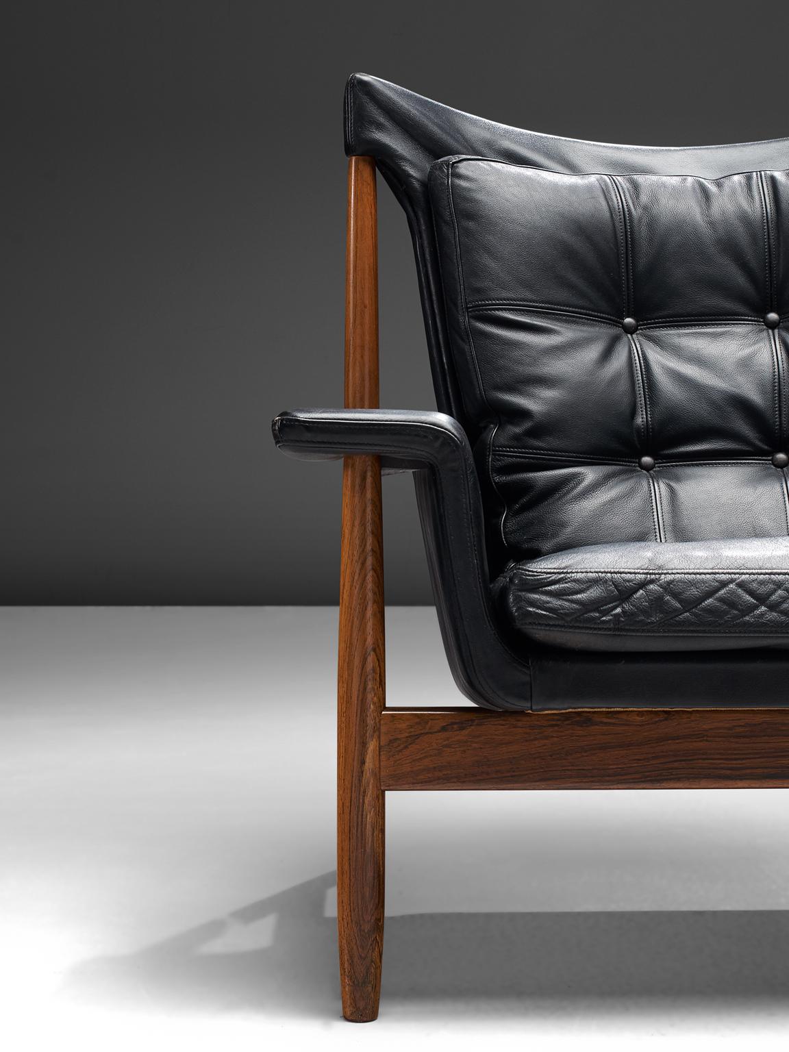 Illum Wikkelsø Lounge Chairs with Black Leather and Rosewood 1