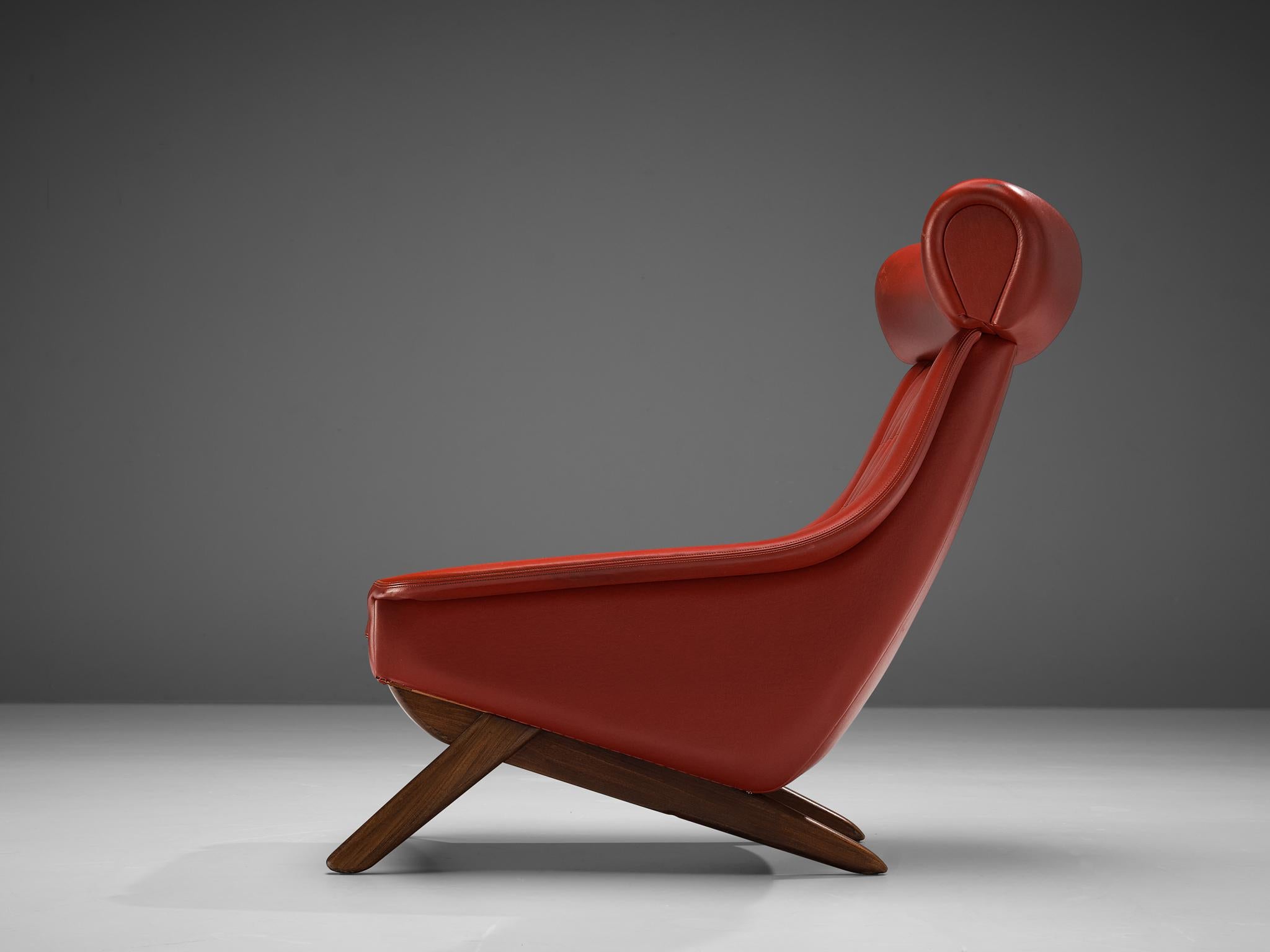 Illum Wikkelsø, 'Ox' lounge chair, leather,ette mahogany, Denmark 1960s.

Well-designed easy chair in red leatherette upholstery by Danish designer Illum Wikkelsø. This 'Ox Chair' shows some interesting details. For instance, the wide and large