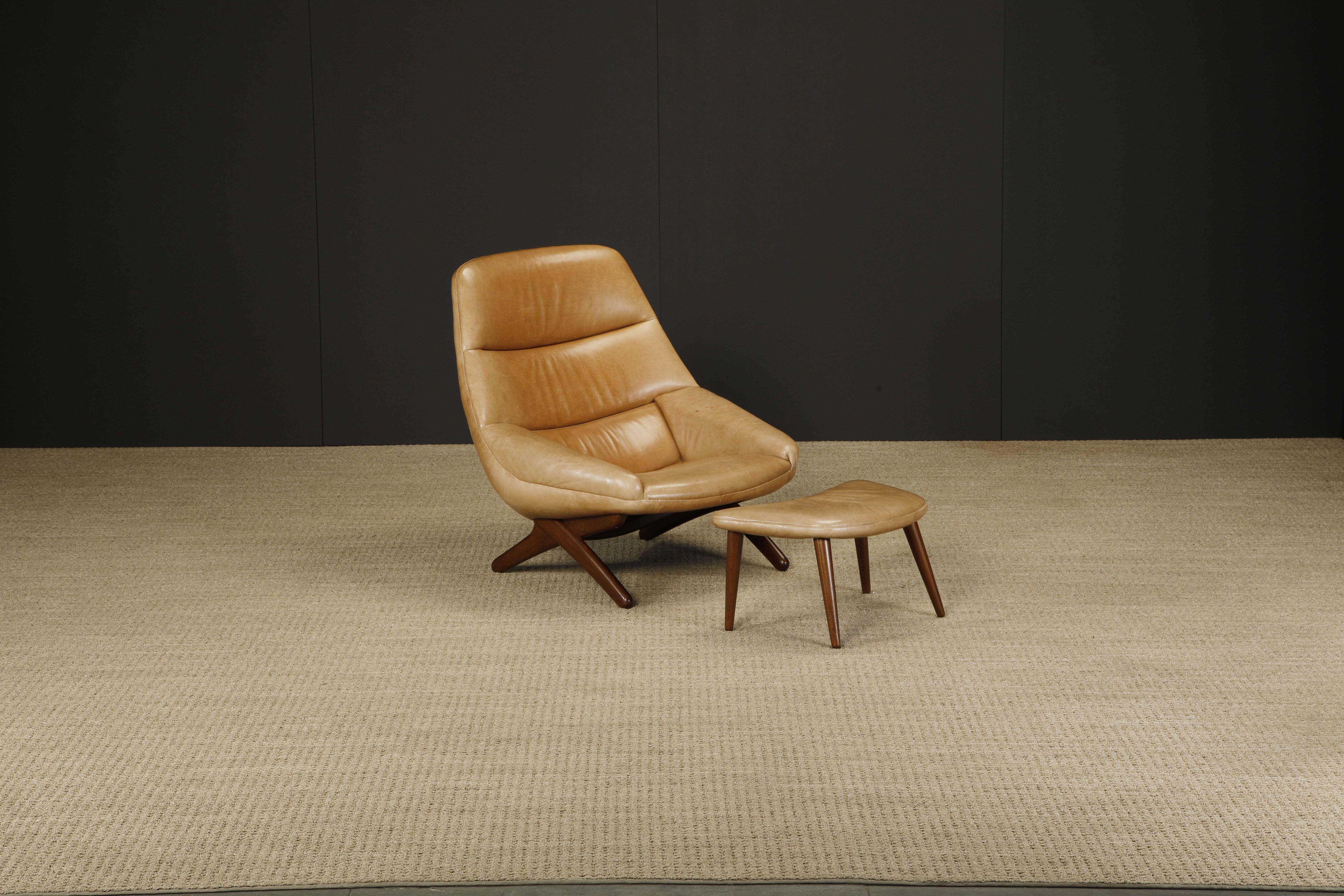 An impressive and sought after 'ML-91' lounge chair and ottoman designed by Illum Wikkelsø and produced by Mikael Laursen, circa 1960 Denmark, featuring a very-comfortable aged leather bucket seat and arms over dark-stained oak legs.  

This model