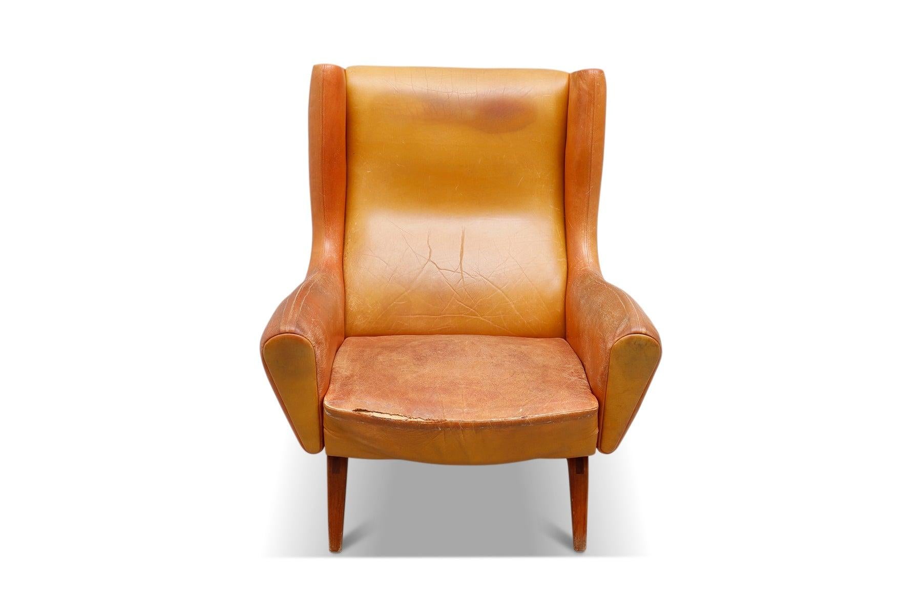 Mid-Century Modern Illum Wikkelsø Model 110 High Wingback Lounge Chair in Original Cognac Leather For Sale