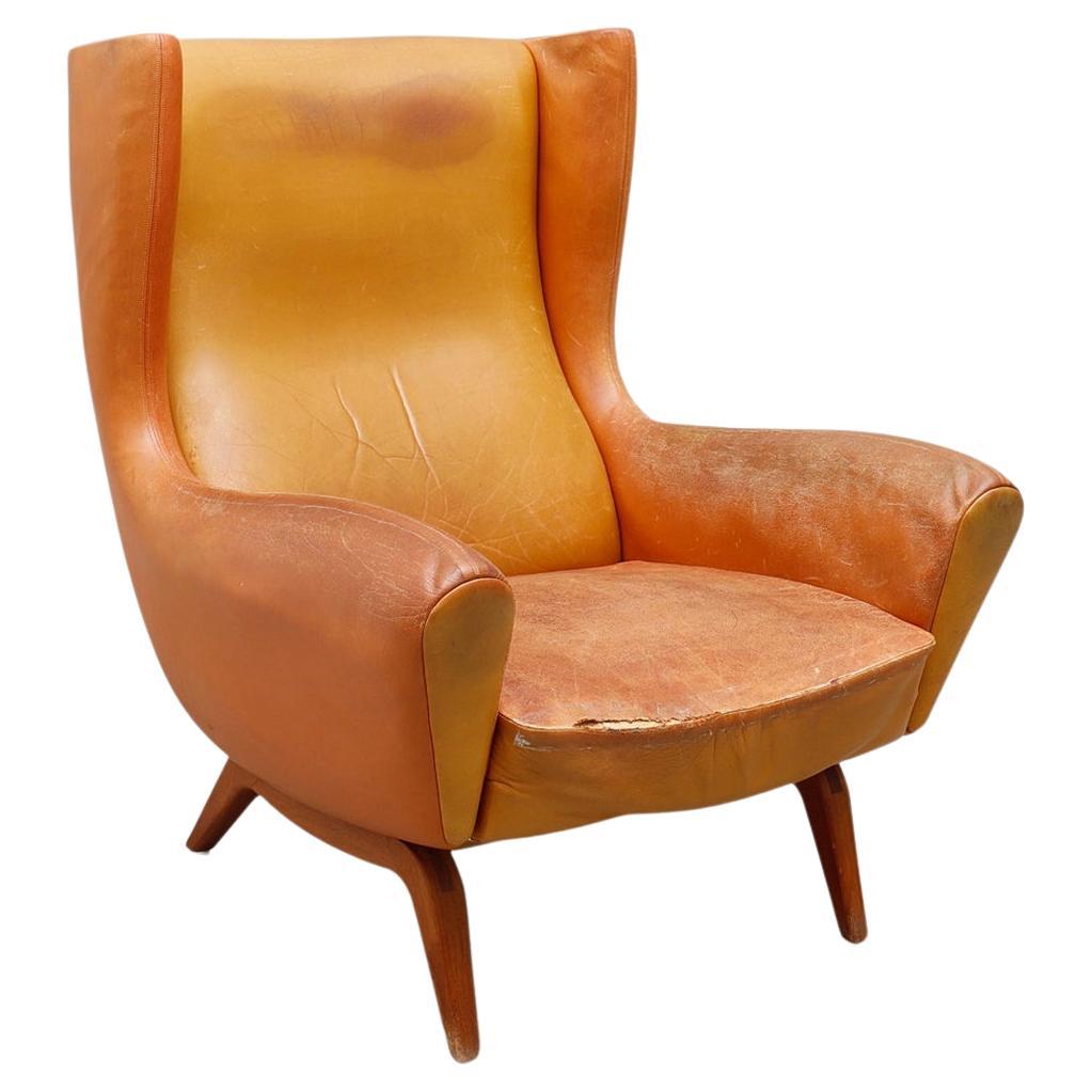 Illum Wikkelsø Model 110 High Wingback Lounge Chair in Original Cognac Leather For Sale