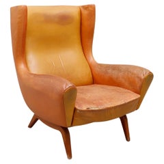 Illum Wikkelsø Model 110 High Wingback Lounge Chair in Original Cognac Leather
