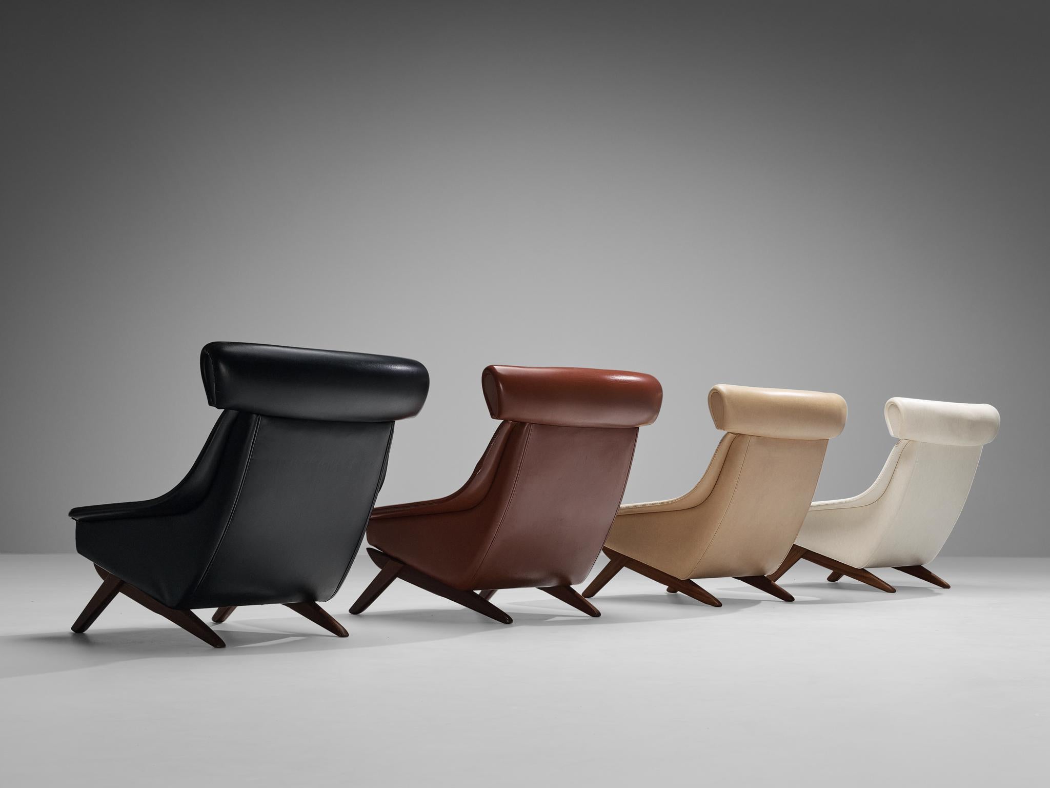 Illum Wikkelsø, lounge chairs, leatherette, teak, Denmark, 1960s.

Well-designed easy chairs in the colors pearlescent white, beige, black, and red leatherette upholstery by Danish designer Illum Wikkelsø. This 'Ox Chair' shows some interesting