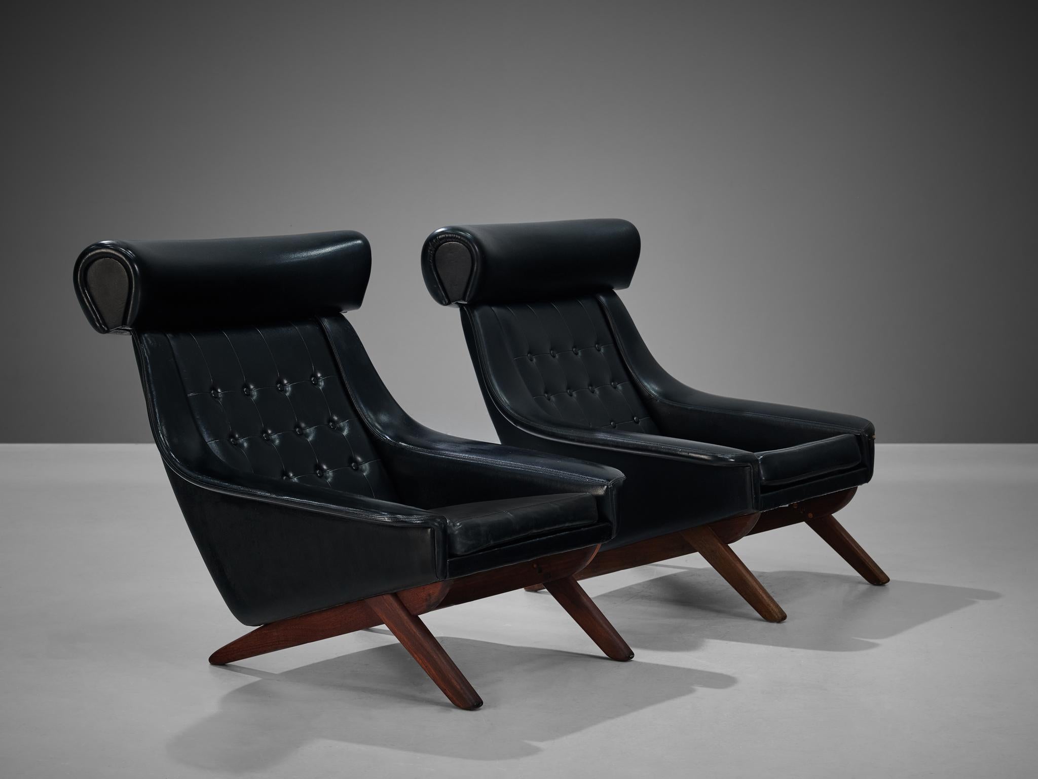 Illum Wikkelsø, pair of lounge chairs, leatherette, teak, Denmark 1960s.

Well-designed pair of easy chairs in black leatherette upholstery by Danish designer Illum Wikkelsø. This 'Ox Chair' shows some interesting details. Like the wide and large