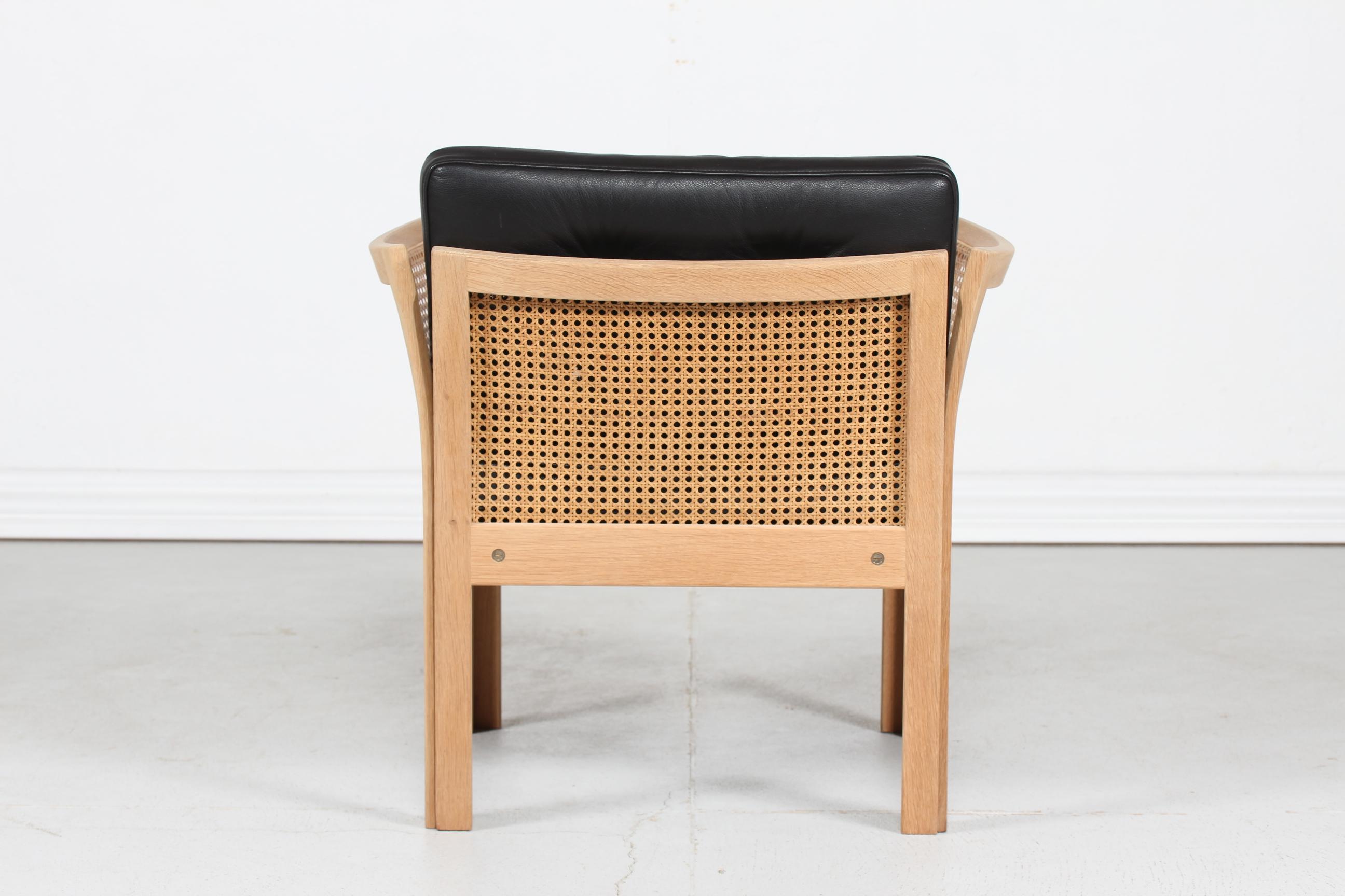 Danish Illum Wikkelsø Plexus Chair of Oak with New Black Leather Upholstery, Denmark