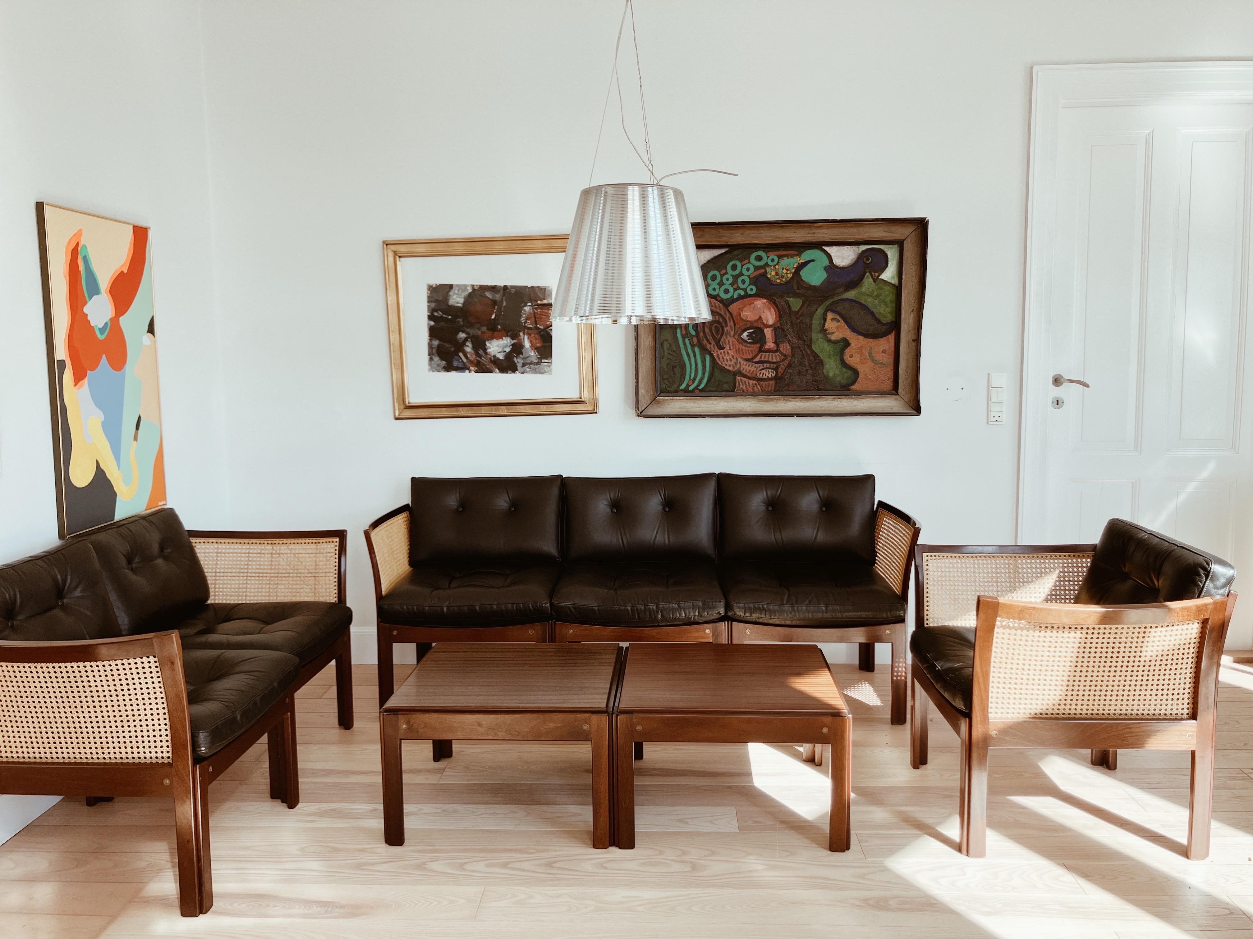 Danish Design - in excelent condotion

“Plexus” Living room set designed by Illum Wikkelsø in the 1960s. Manufactured by CFC Silkeborg Furniture, Denmark. 

The woven cane is in perfect condition - no cracks! The leather and wood is with minimal