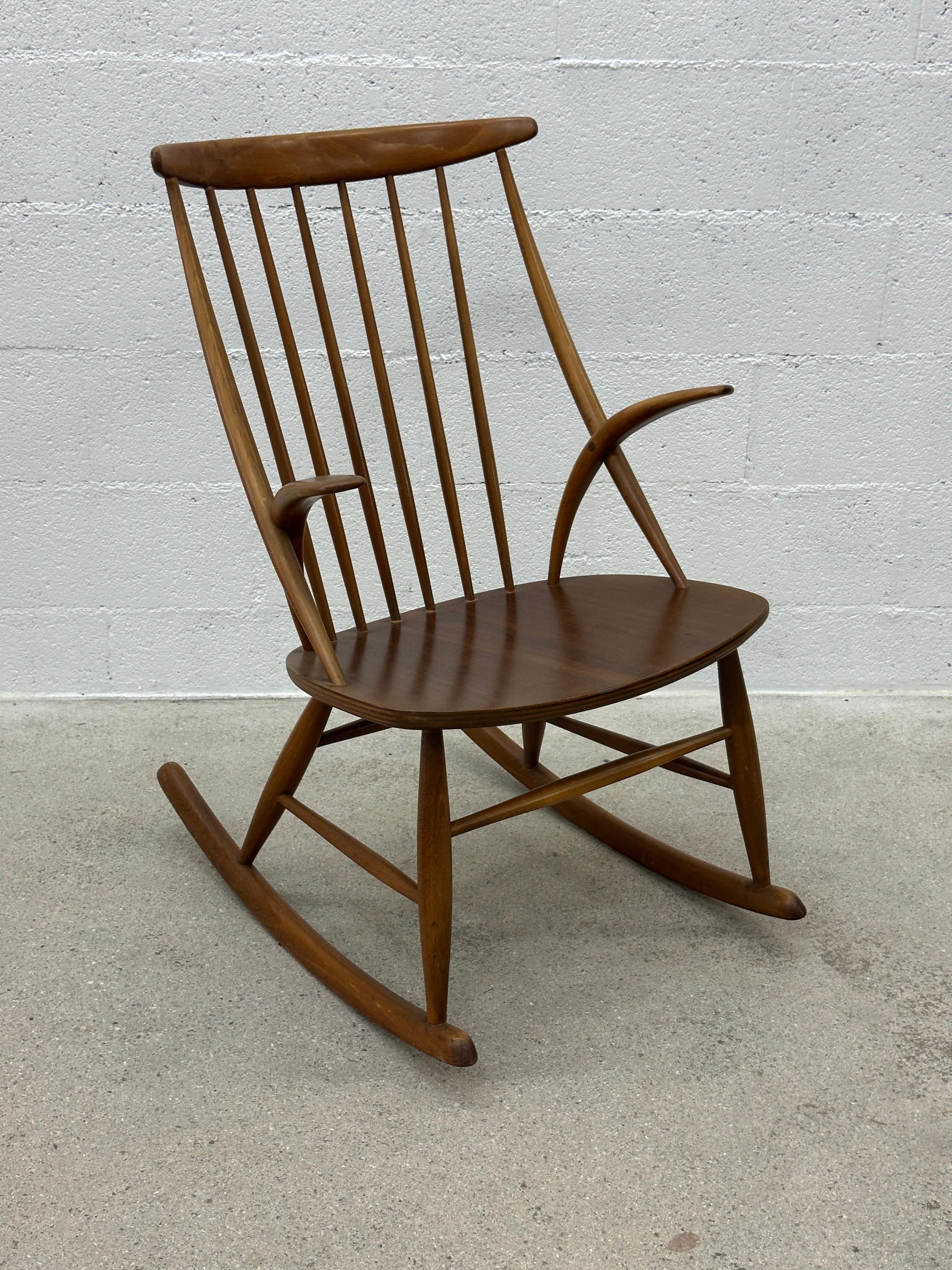 Illum Wikkelsø Rocking Chair « IW3 » for Niels Eilersen. Ready to relax? A celebration in Denmark in the 1960s. The chair is in very good condition considering its age.

Delicate design by the Danish architect and designer Illum Wikkelsø. The