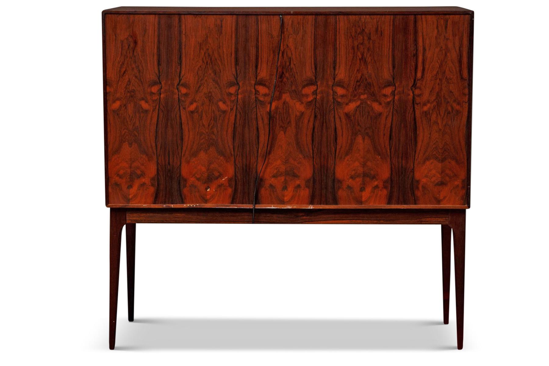 Origin: Denmark
Designer: Illum Wikkelsø
Manufacturer: C.F. Christiansen
Era: 1960s
Materials: Rosewood
Measurements: 47? wide x 18? deep x 45.5? tall
Interior 27? wide x 16? deep x 24? Tall.