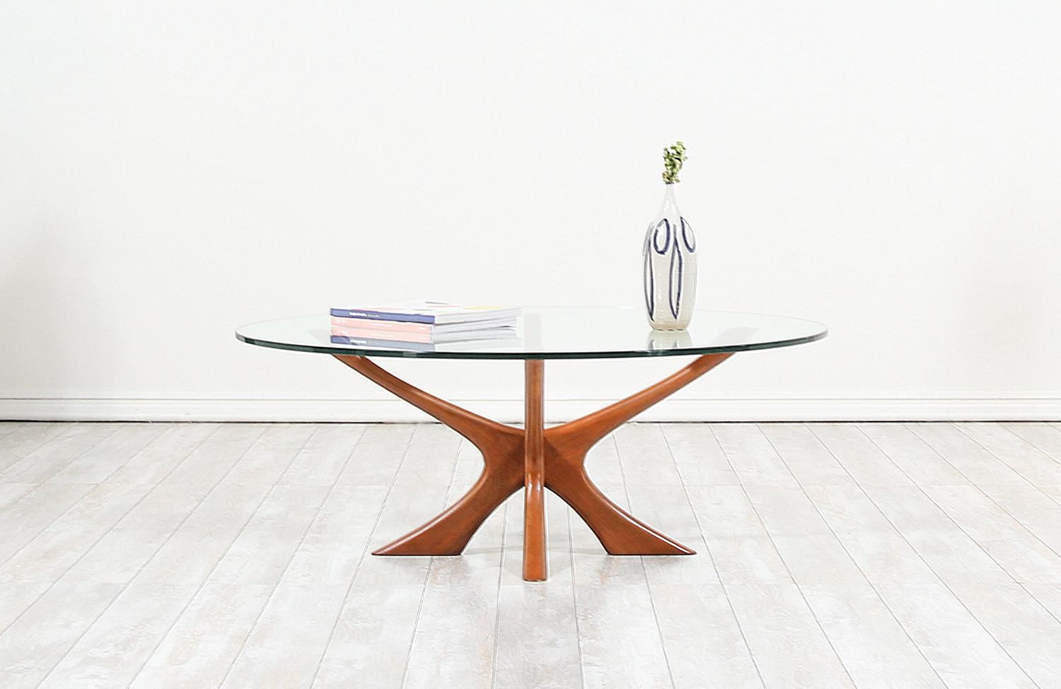 Mid-Century Modern Illum Wikkelsø Sculpted Teak and Glass Coffee Table